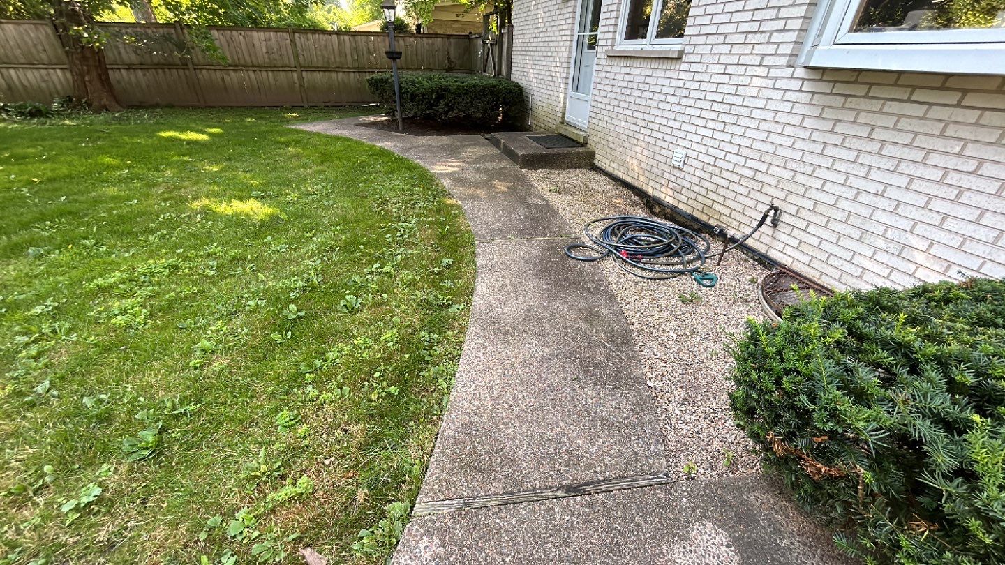 Aggregate concrete cleaning and sealing using Surebond SB-9000 by Northern Power Washing LLC.