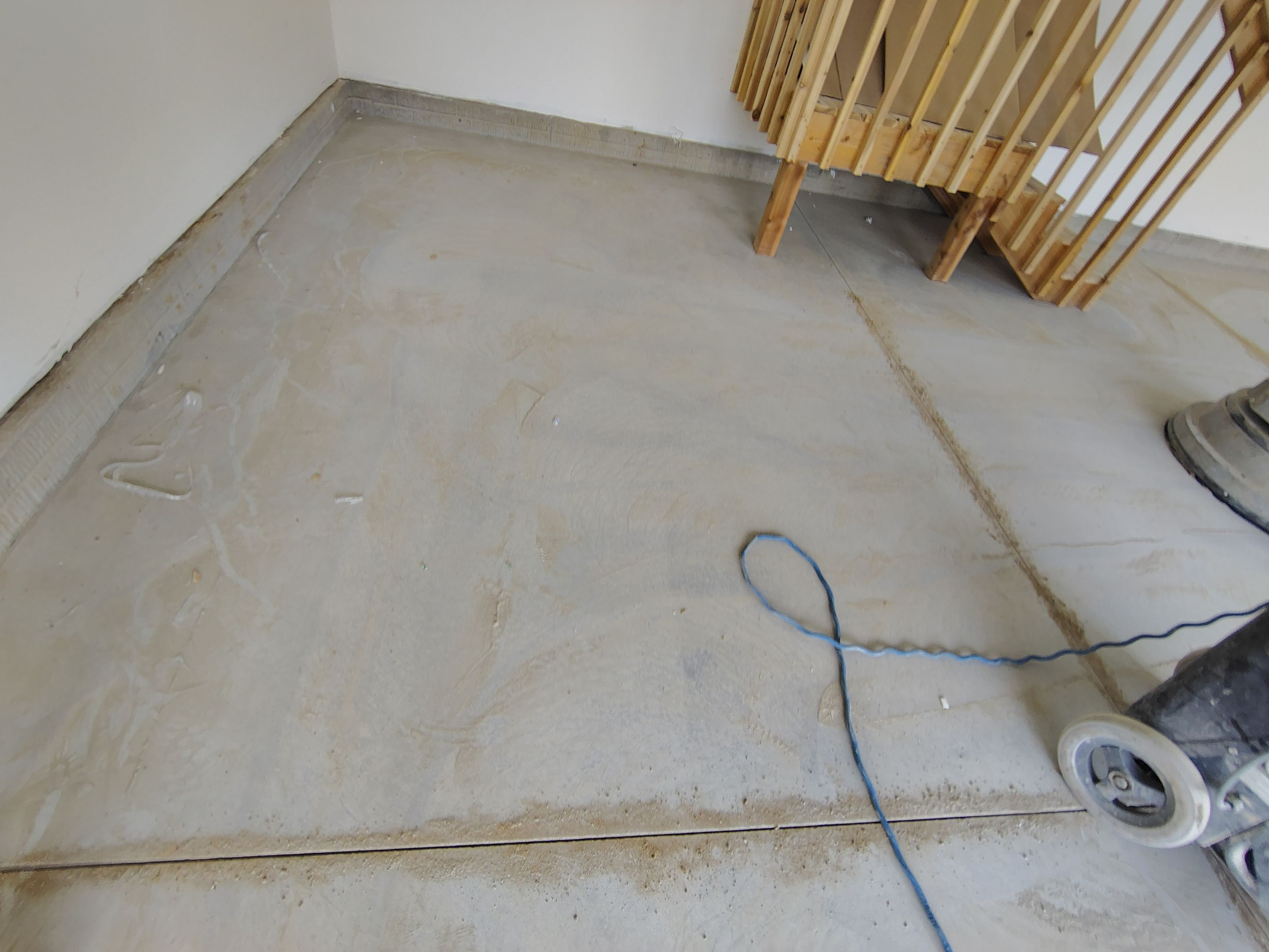 Sioux Falls Garage Floor Transformation with Gray Decorative Flake Coating by Select Painting, Coatings & Garage Cabinets
