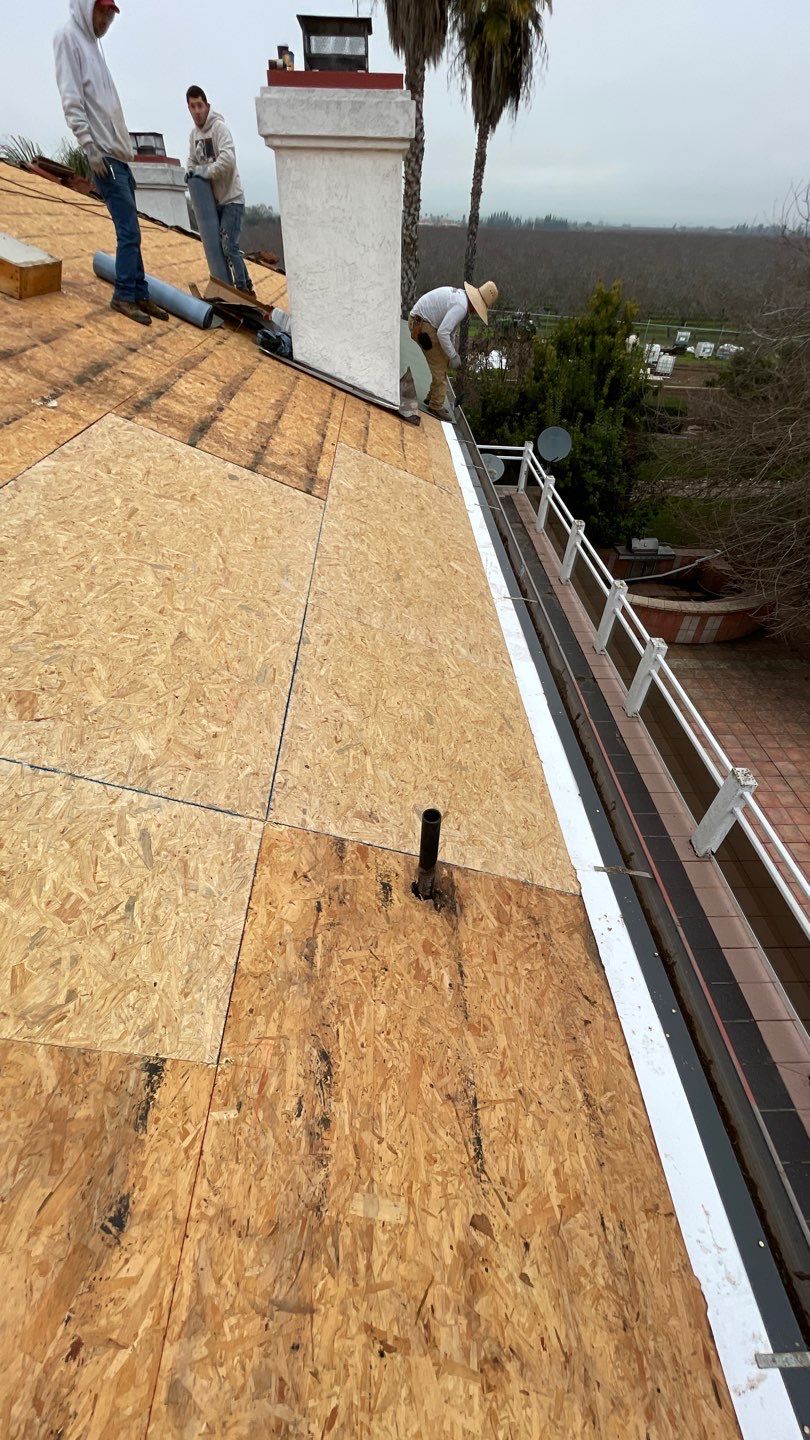 Tile refurbish project using existing tiles and replaced underlayment and battens by Straight Edge Roofing Inc