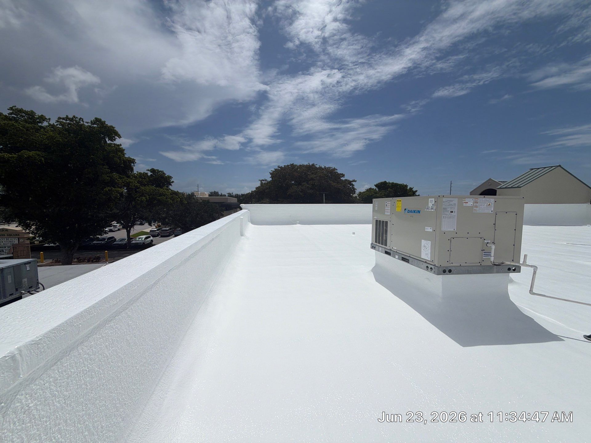 Commercial Flat Roof Restoration and Elastomeric Waterproofing in Delray Beach by Roof King LLC