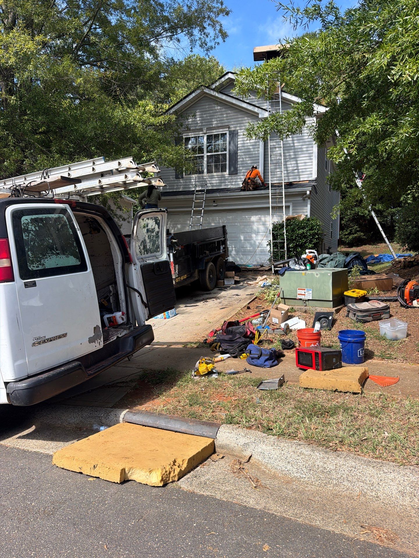 Roof and gutter replacement by hail and wind damage by Just Brilliant Restoration JBR