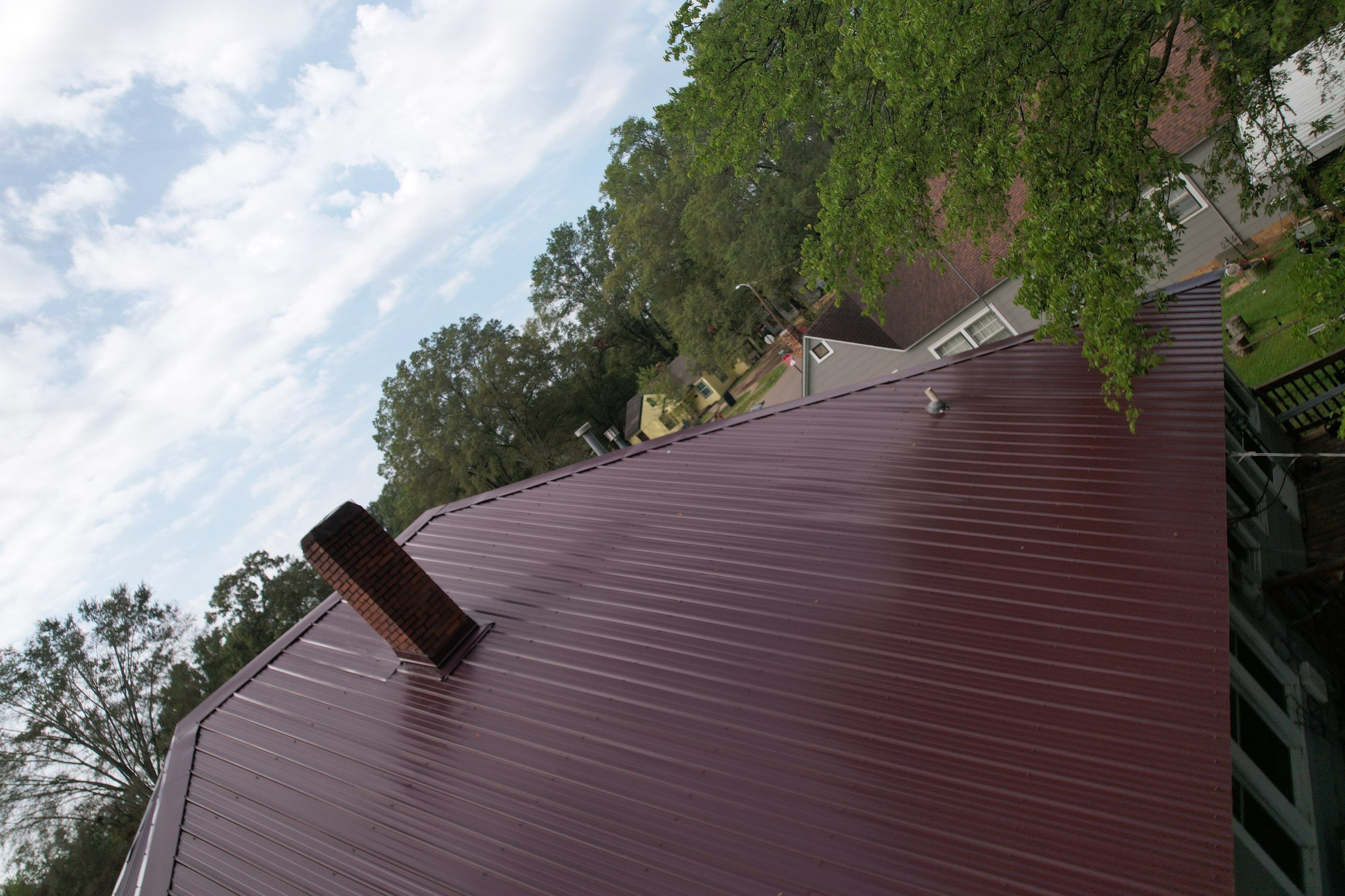 Residential Metal Roof Replacement using Reed's Metals: Colored Residental Panel (Burgundy) by Hostetler Roofing