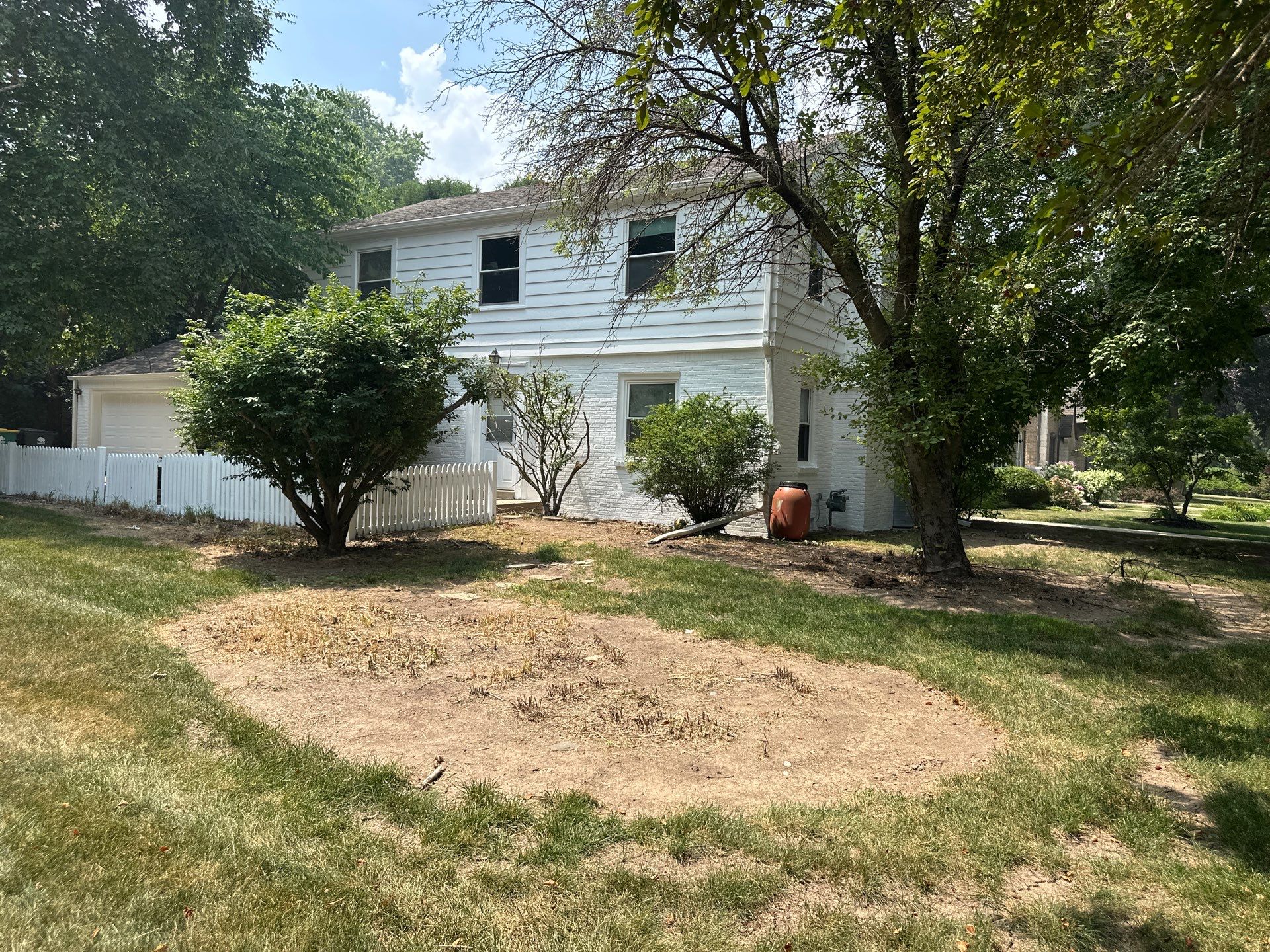 Shorewood Exterior Painting and Siding Refresh With Contrast Trim by OCS Contracting Services
