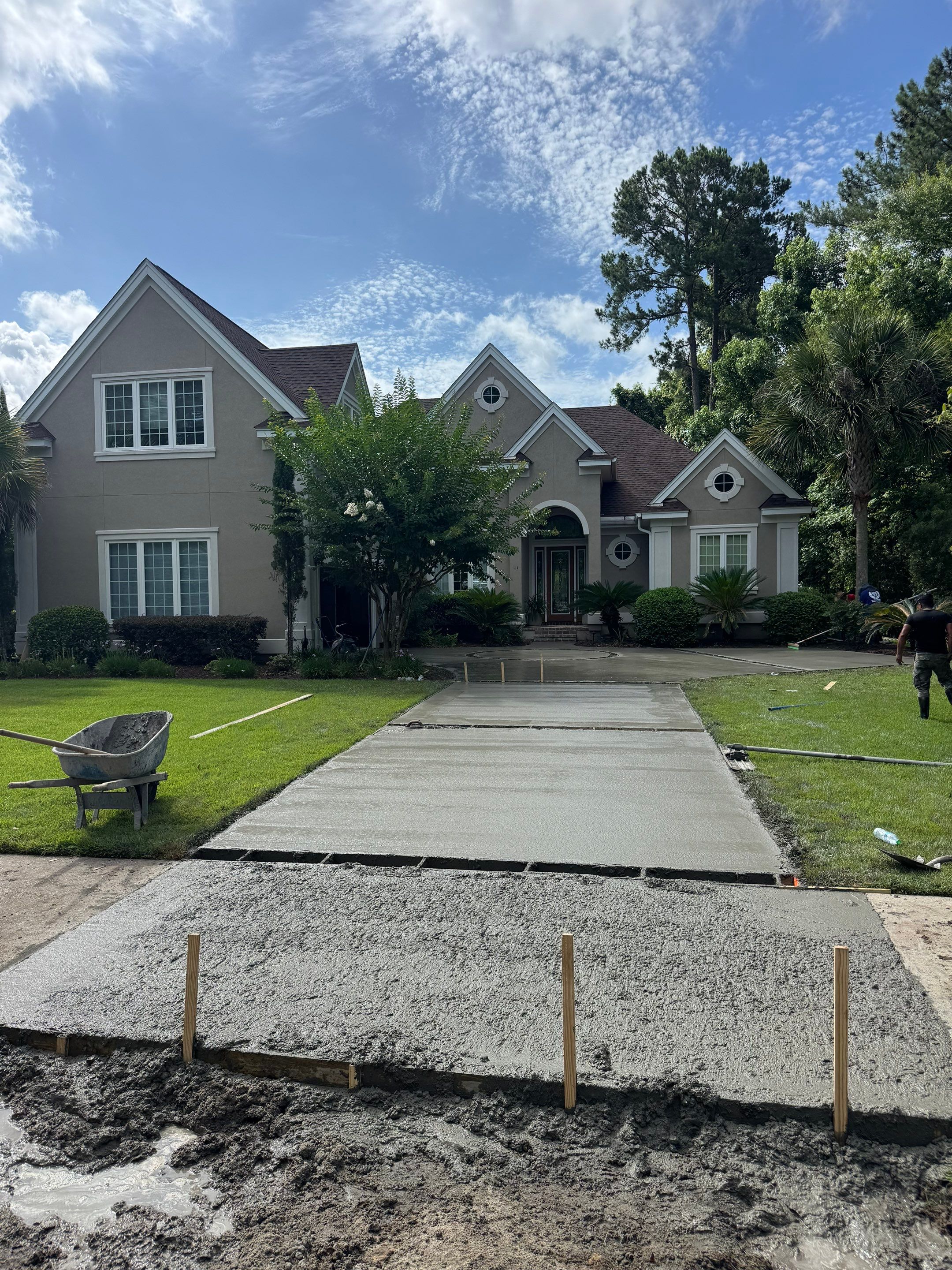 Custom Concrete Driveway and Decorative Paver Installation in Bluffton by Lowcountry Scapes, LLC