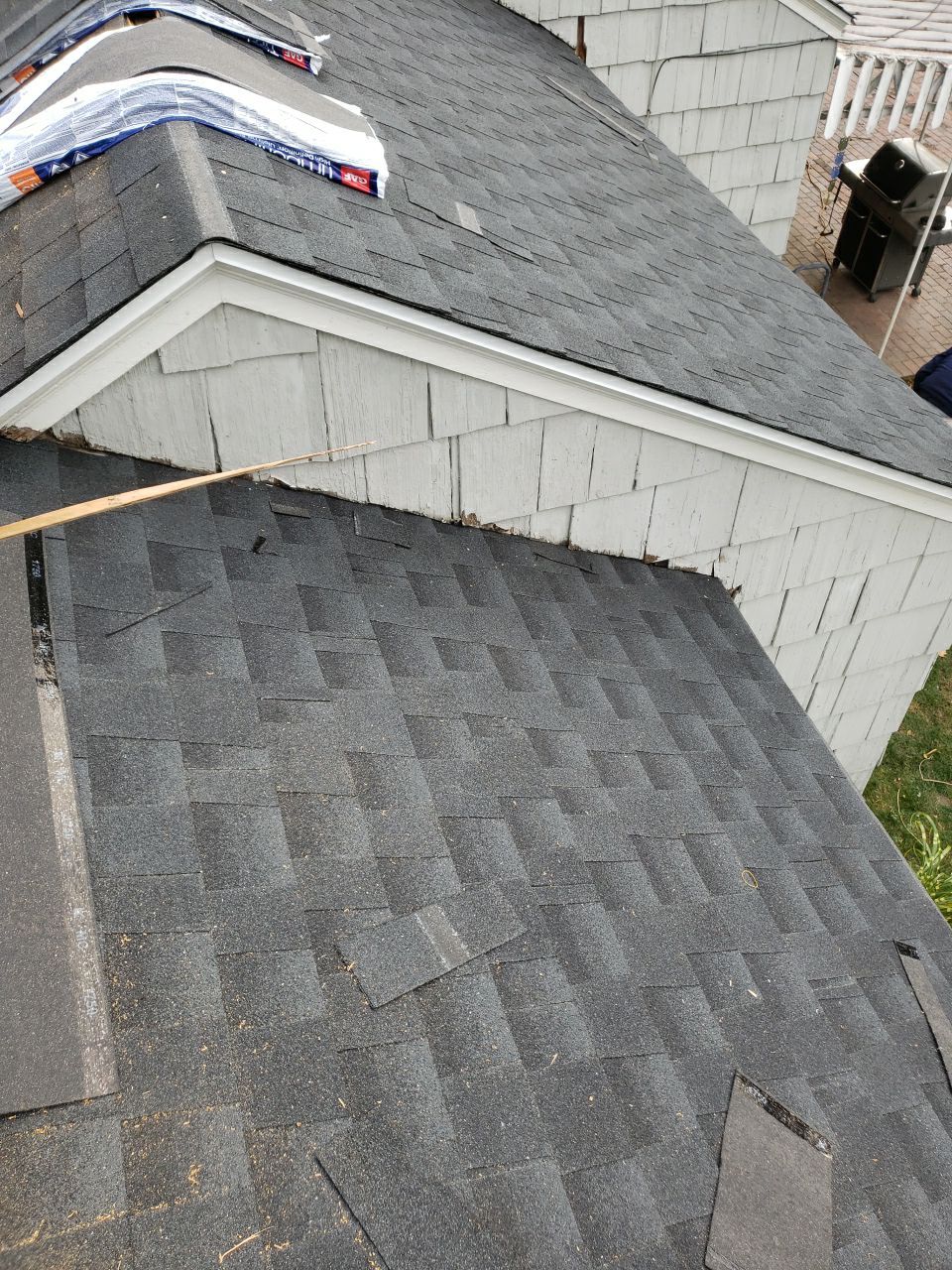 Asphalt Roof Replacement by Custom Installations