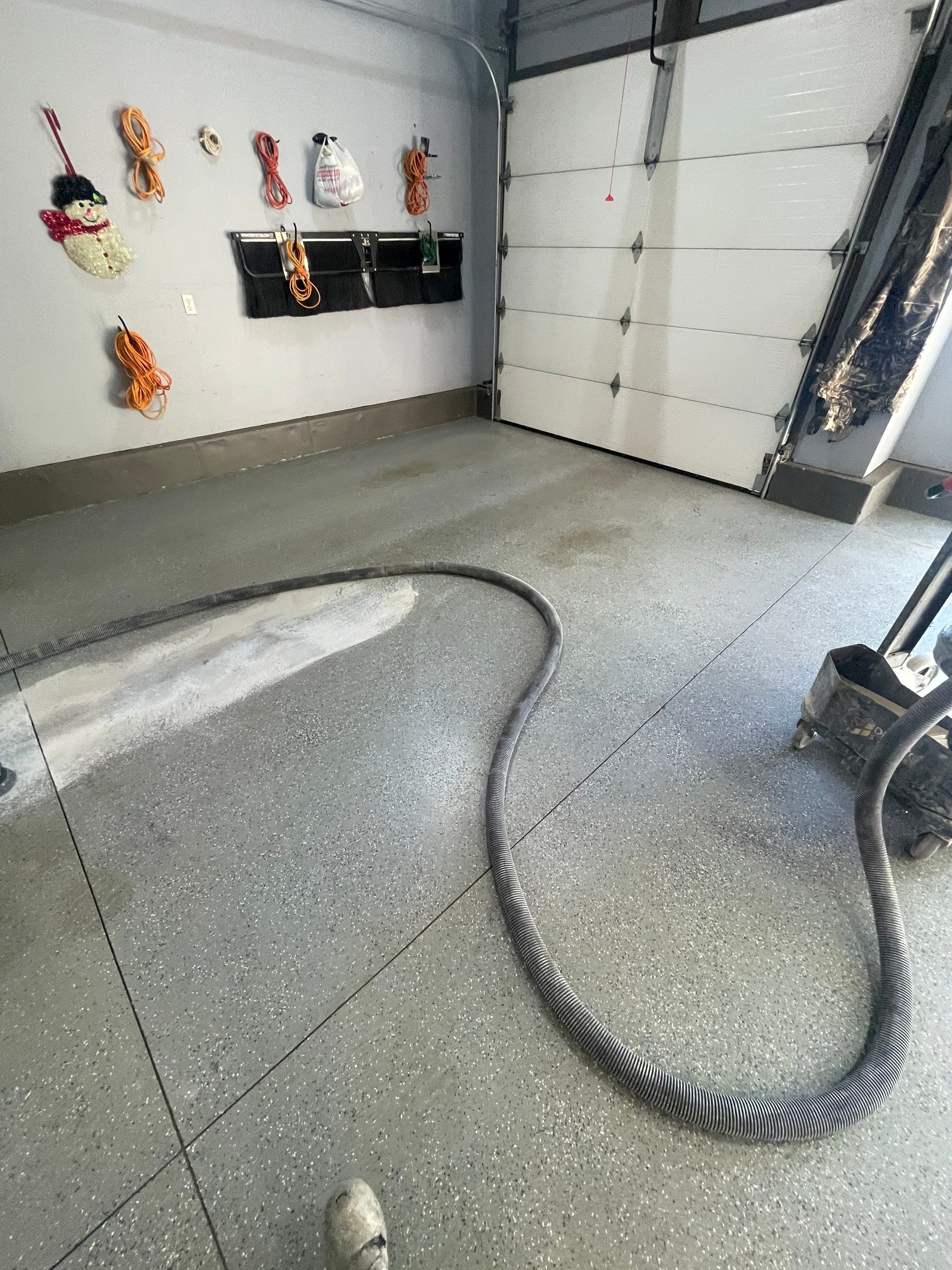Residential Garage Floor Coating in Sioux Falls by Select Painting, Coatings & Garage Cabinets