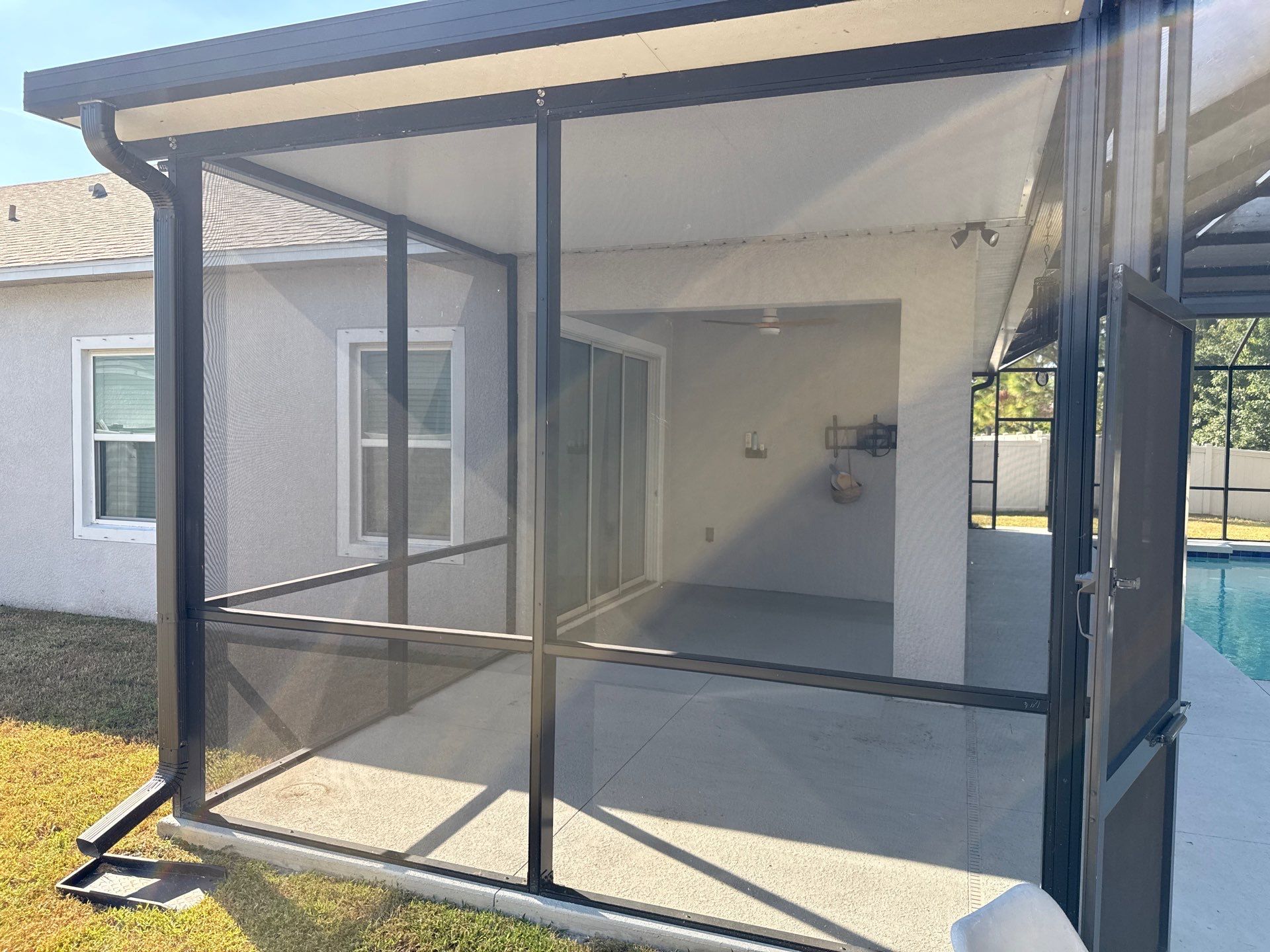 Painted Pool Deck & Screen Enclosure Cleaning | Heron Creek, Palmetto FL by Sunshine AquaWash