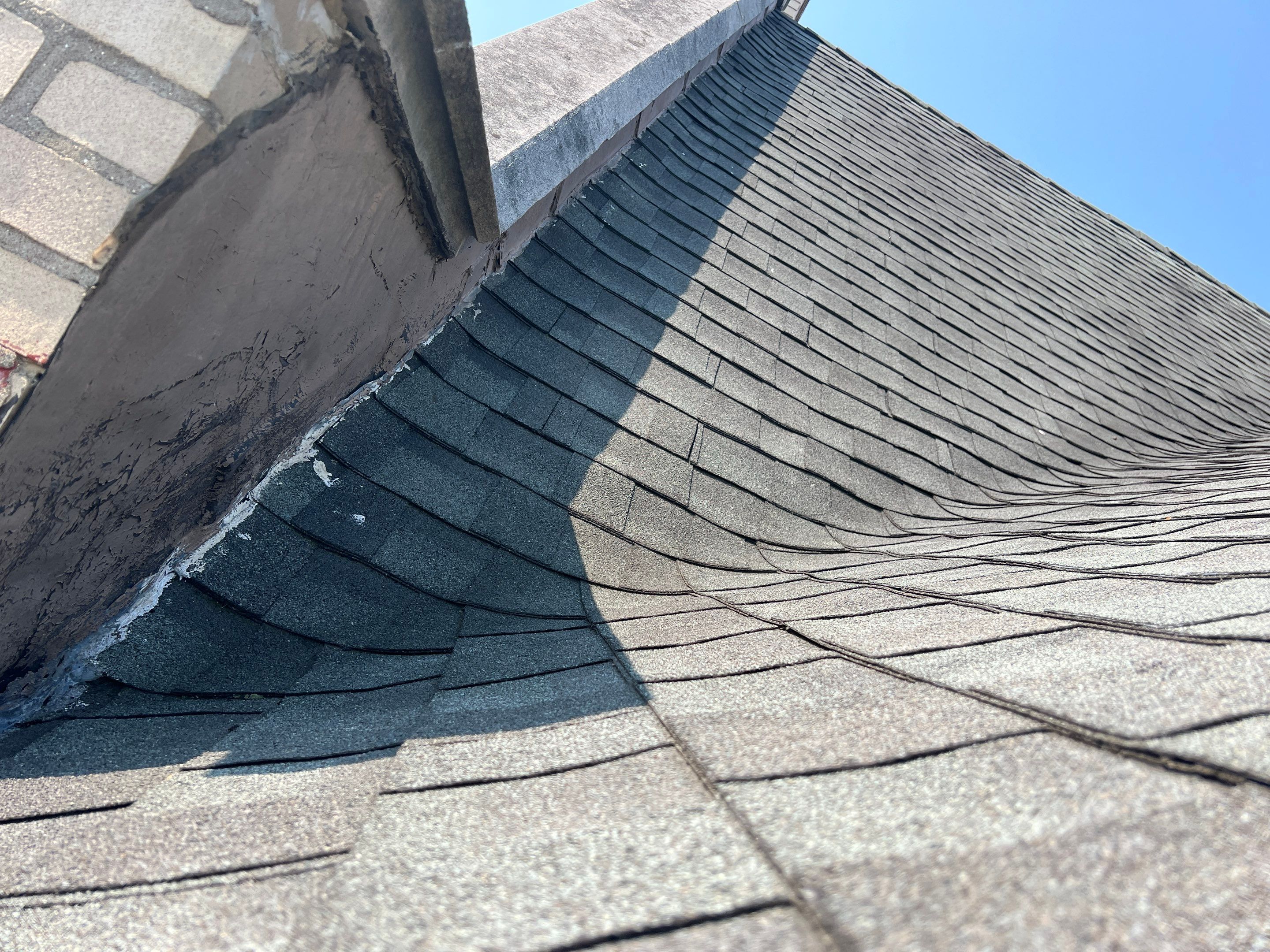 Commercial Roofing Installation using Standing Seam Metal - Frost Black by RoofX 