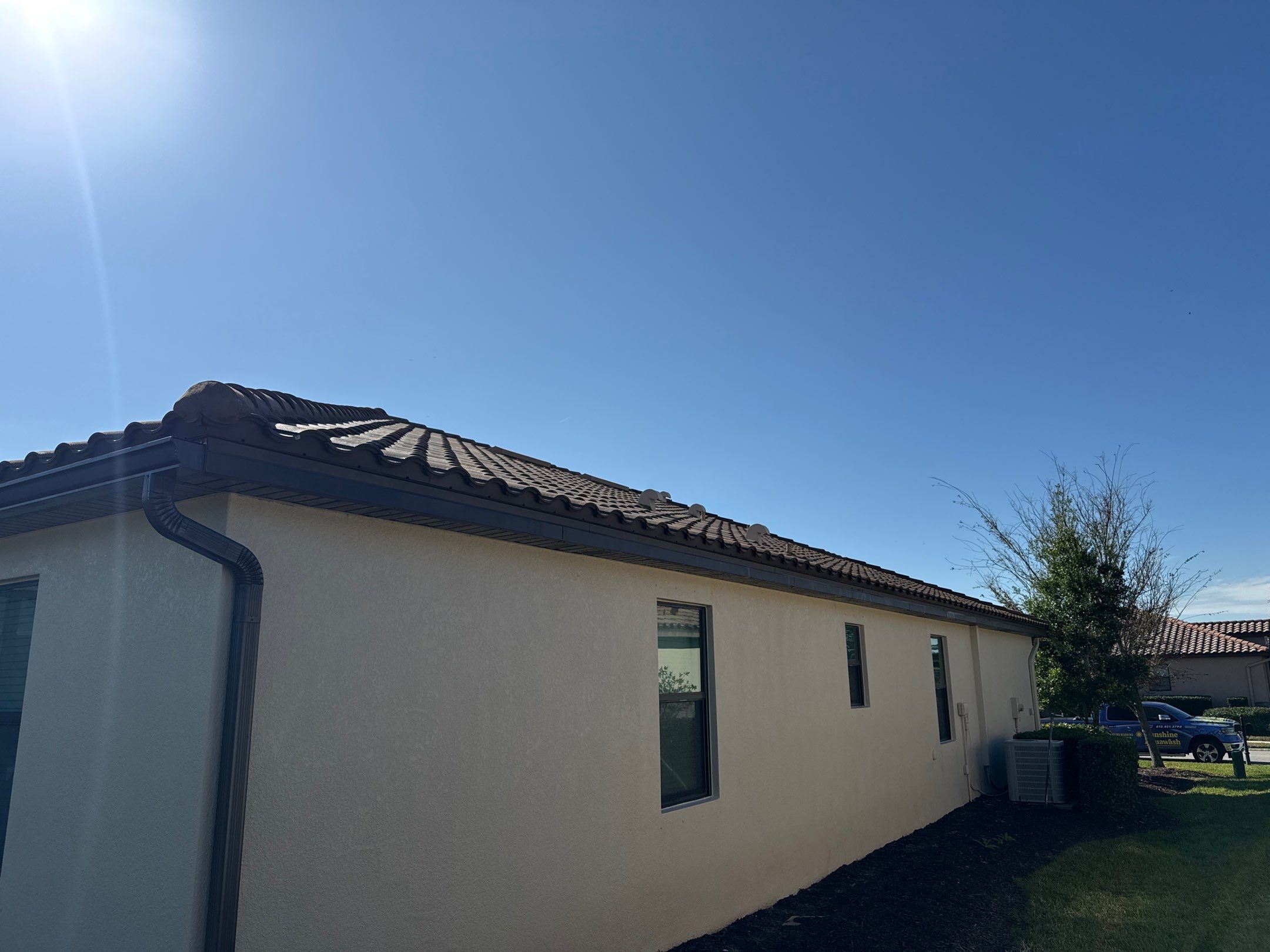 Barrel Tile Roof Cleaning & Paver Driveway Cleaning in River Strand at Heritage Harbour | Bradenton, FL by Sunshine AquaWash