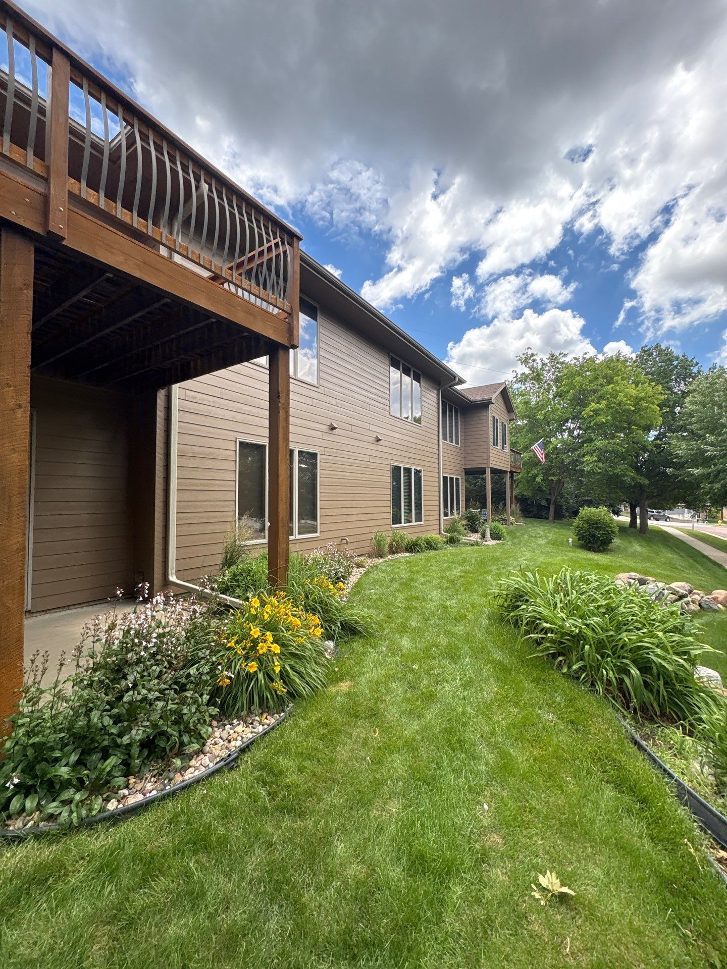 Multi-Story Residential Exterior Painting and Siding Refresh in Sioux Falls by Select Painting, Coatings & Garage Cabinets