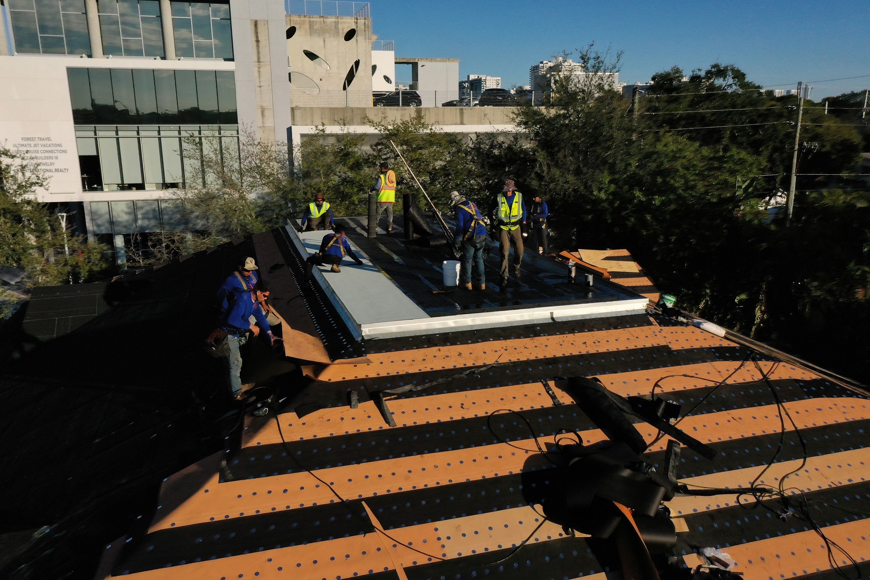 COMMERCIAL REROOF 24 GUAGE MEDIUM BRONZE 1-1/2" MECHANICAL SEAM "ZEBRA METHOD" by Earl W. Johnston Roofing 