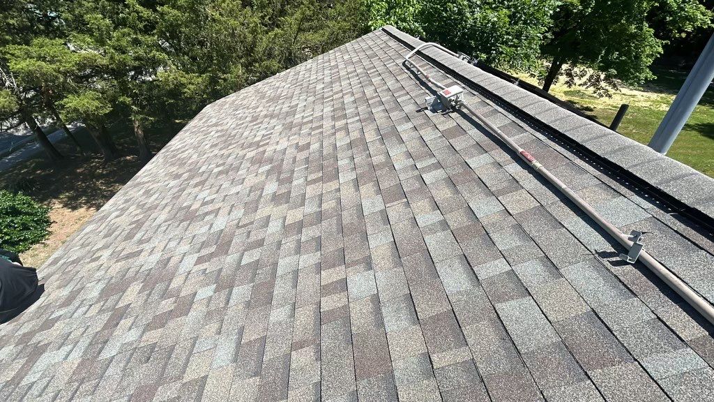 Weathered Wood Shingles by Reimagine Roofing