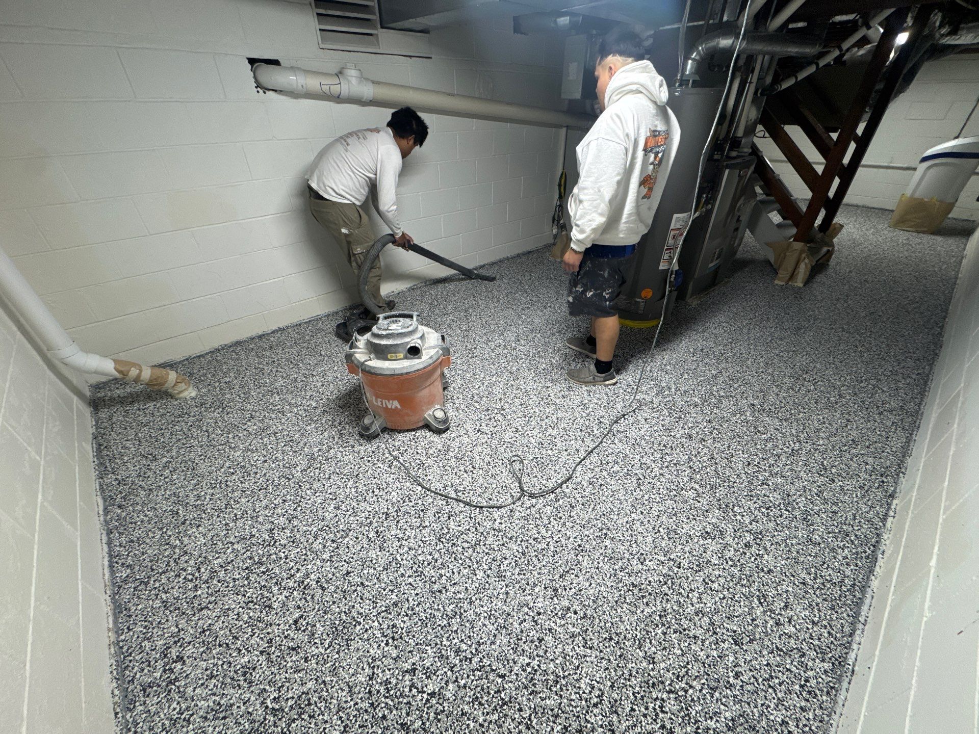 Repaint Walls and Apply Epoxy Flooring by Midwest Paint LLC
