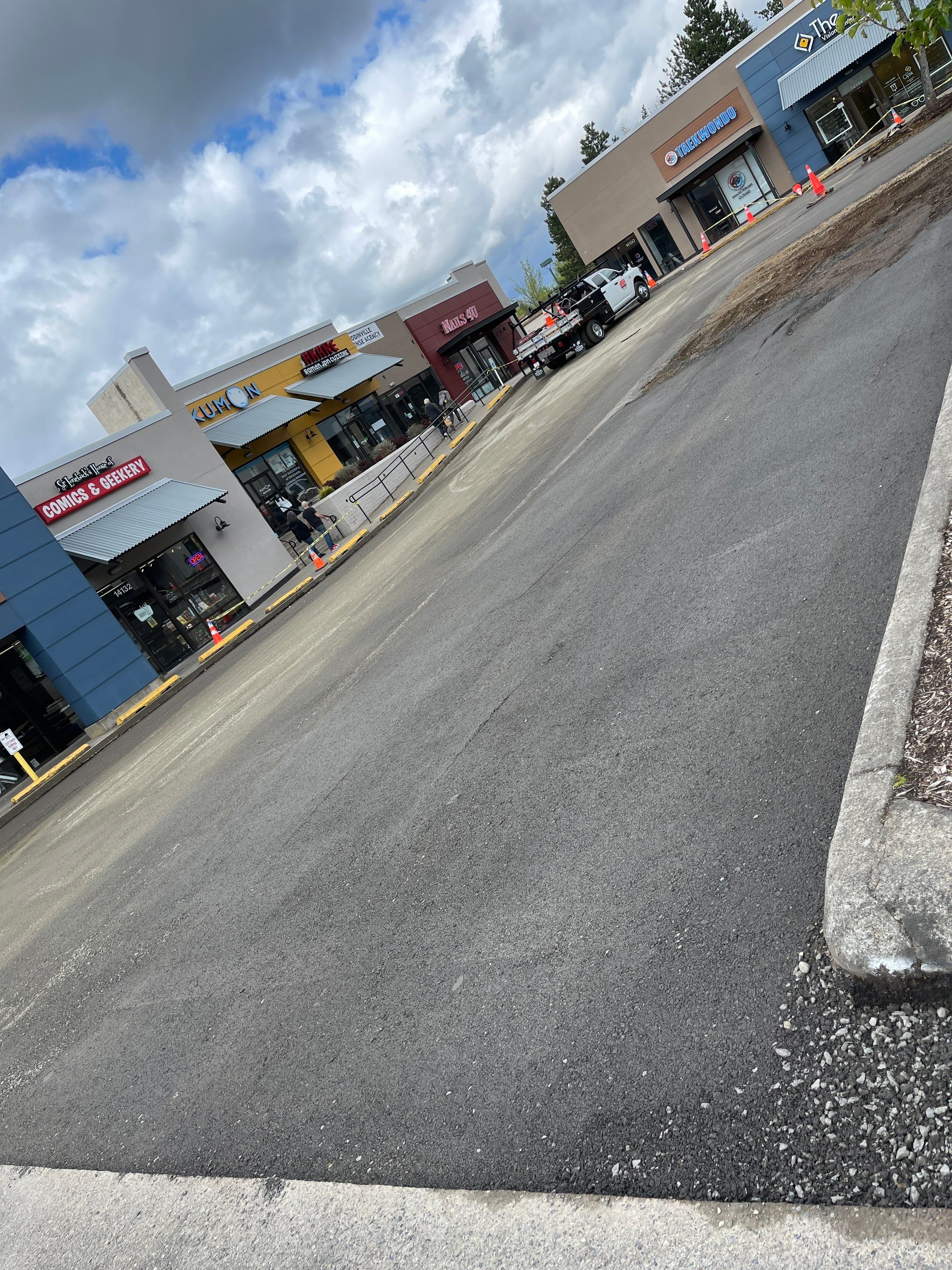 Colliers - Woodinville New Asphalt Parking Lot by Jireh Asphalt & Concrete Inc 