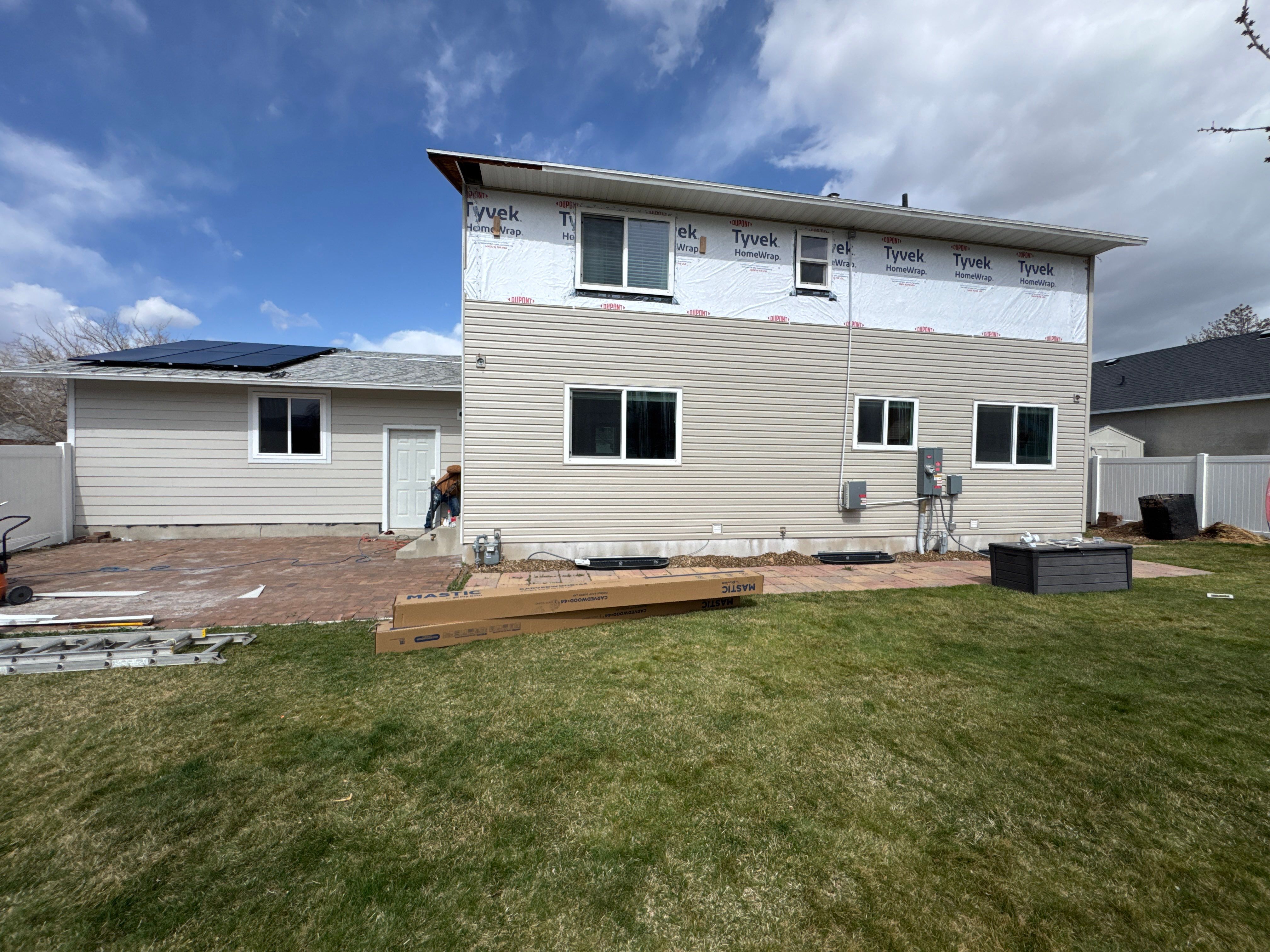 Sandy | Strategic Hardie & Vinyl Integration | Cobble Stone & Desert Sand by Ideal Siding Utah