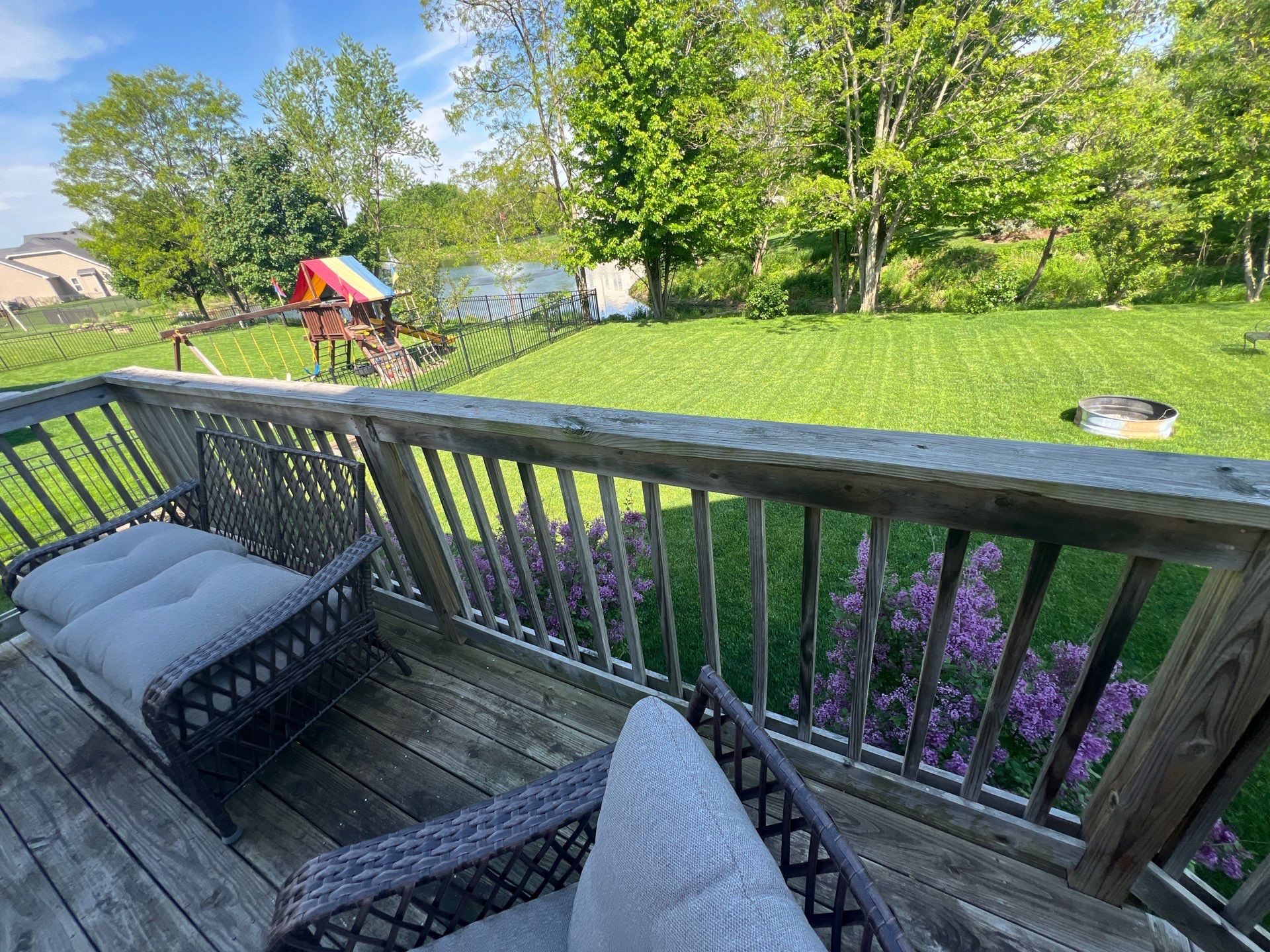 wood deck cleaning and staining by Northern Power Washing LLC.
