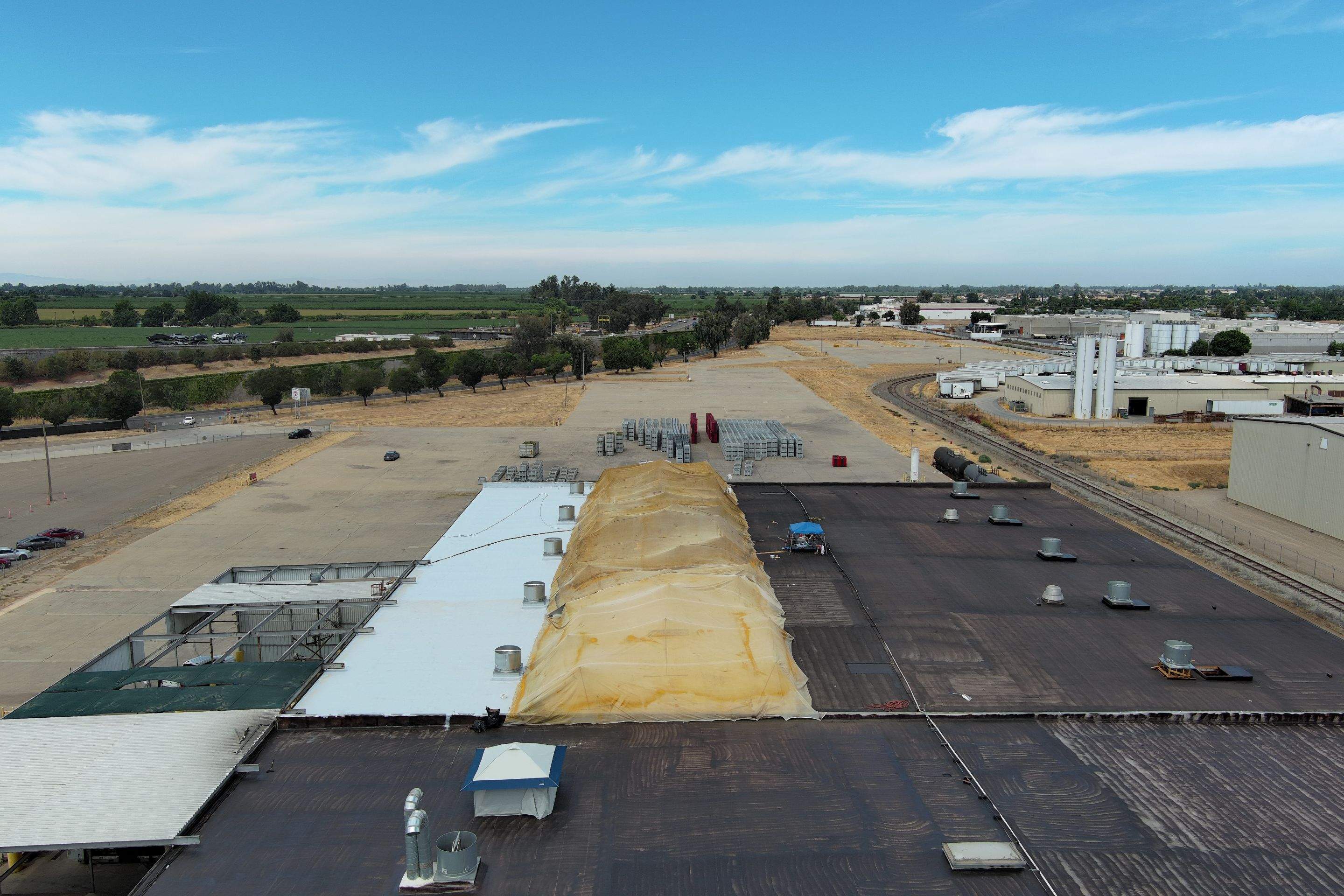 Pro Farms Spray foam roofing project by Straight Edge Roofing Inc