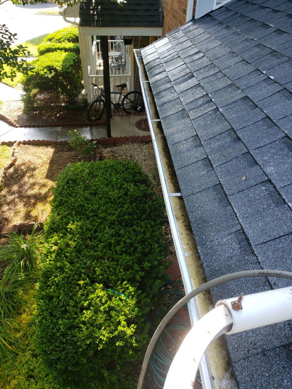 Gutter Cleaning using water by Power Wash Masters LLC