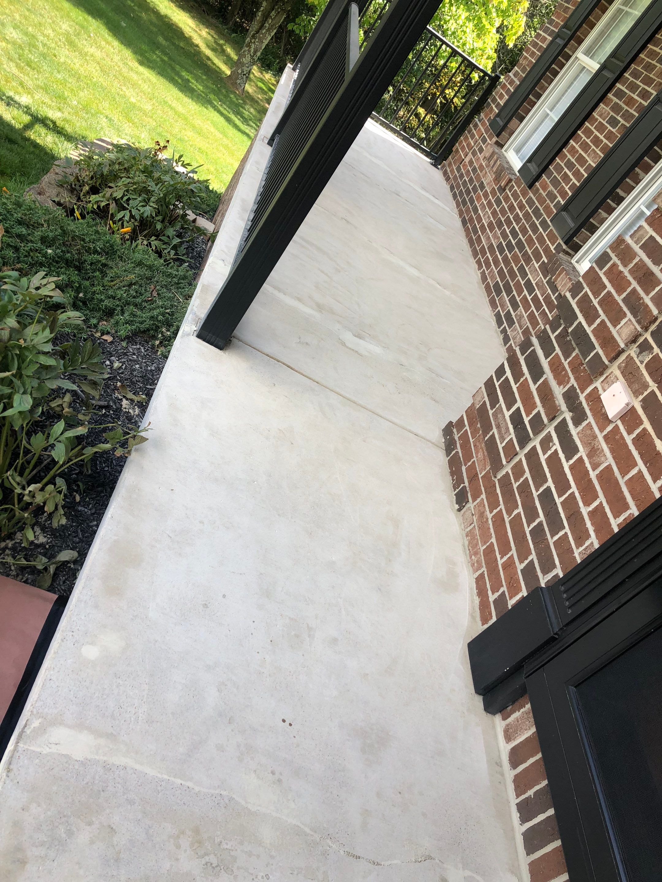 Porch + Garage Project in Weirton by Floors in a Day, Inc