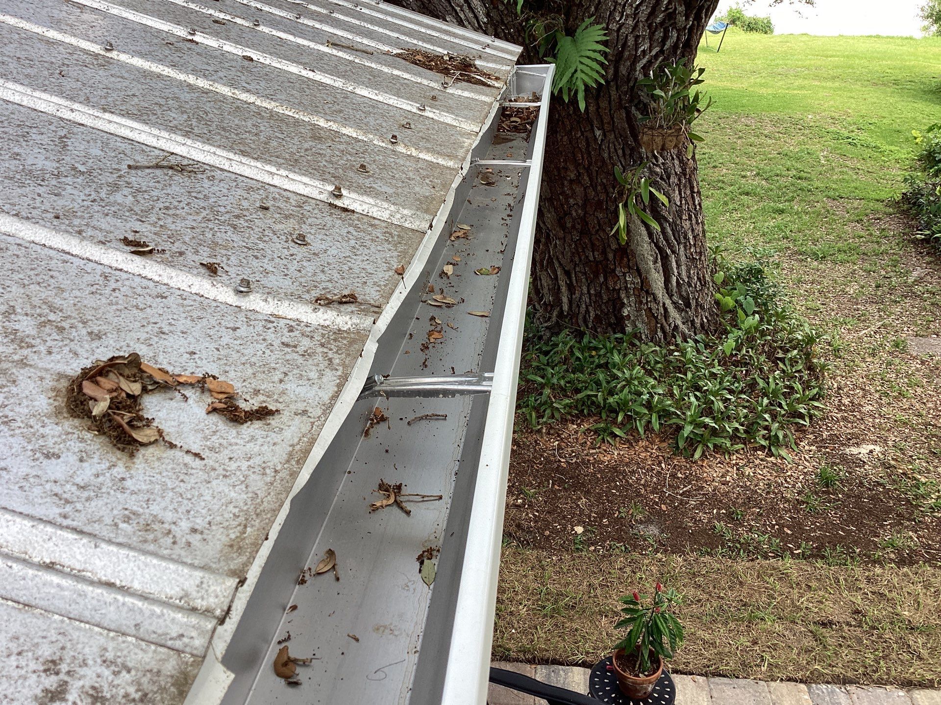 White 6-Inch Gutters and Leaf Guard Installation in Fort Myers FL by Gutter Professors