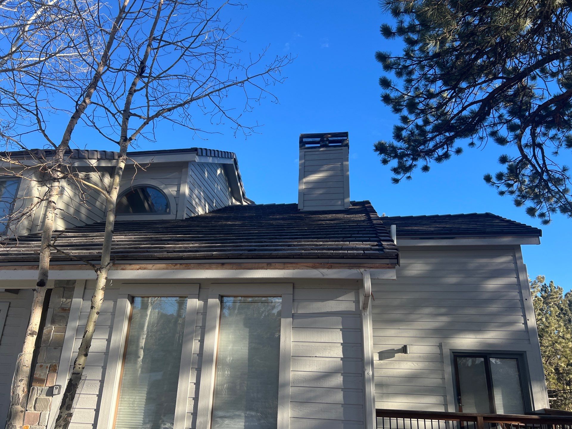 Residential Roofing Installation using Concrete Tile by Blue Peaks Roofing LLC 