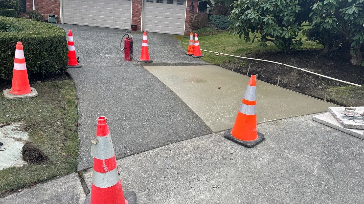 Concrete Driveway Patch Repair & Sealer | Mukilteo  by Jireh Asphalt & Concrete Inc 