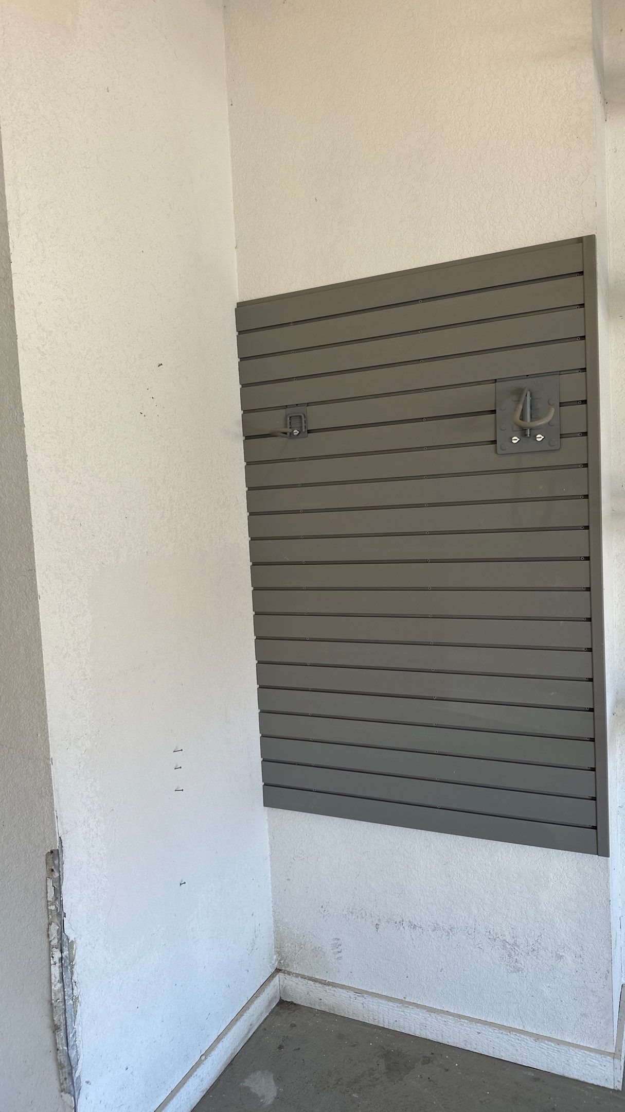 Melissa L. upgraded her garage with slatwall and overhead racks by Banner Garage