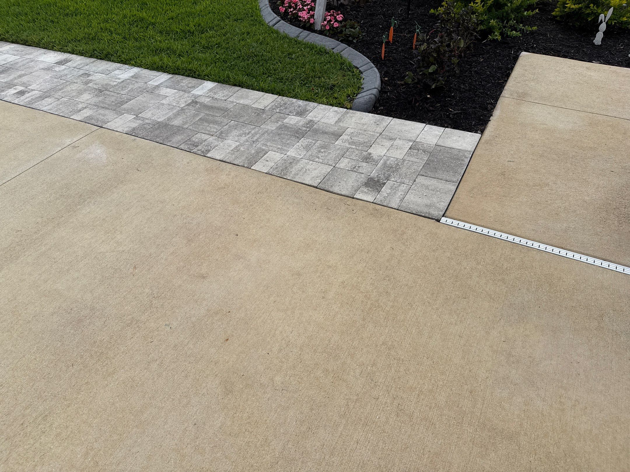 Rust Stain Removal from Concrete Driveway and Pavers in Park East at Azario | Lakewood Ranch, FL by Sunshine AquaWash