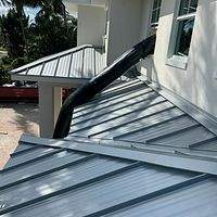 .032 Aluminum 1.5" Mechanical Seam Silver Metallic by Total Roofing System The Metal Roof Experts