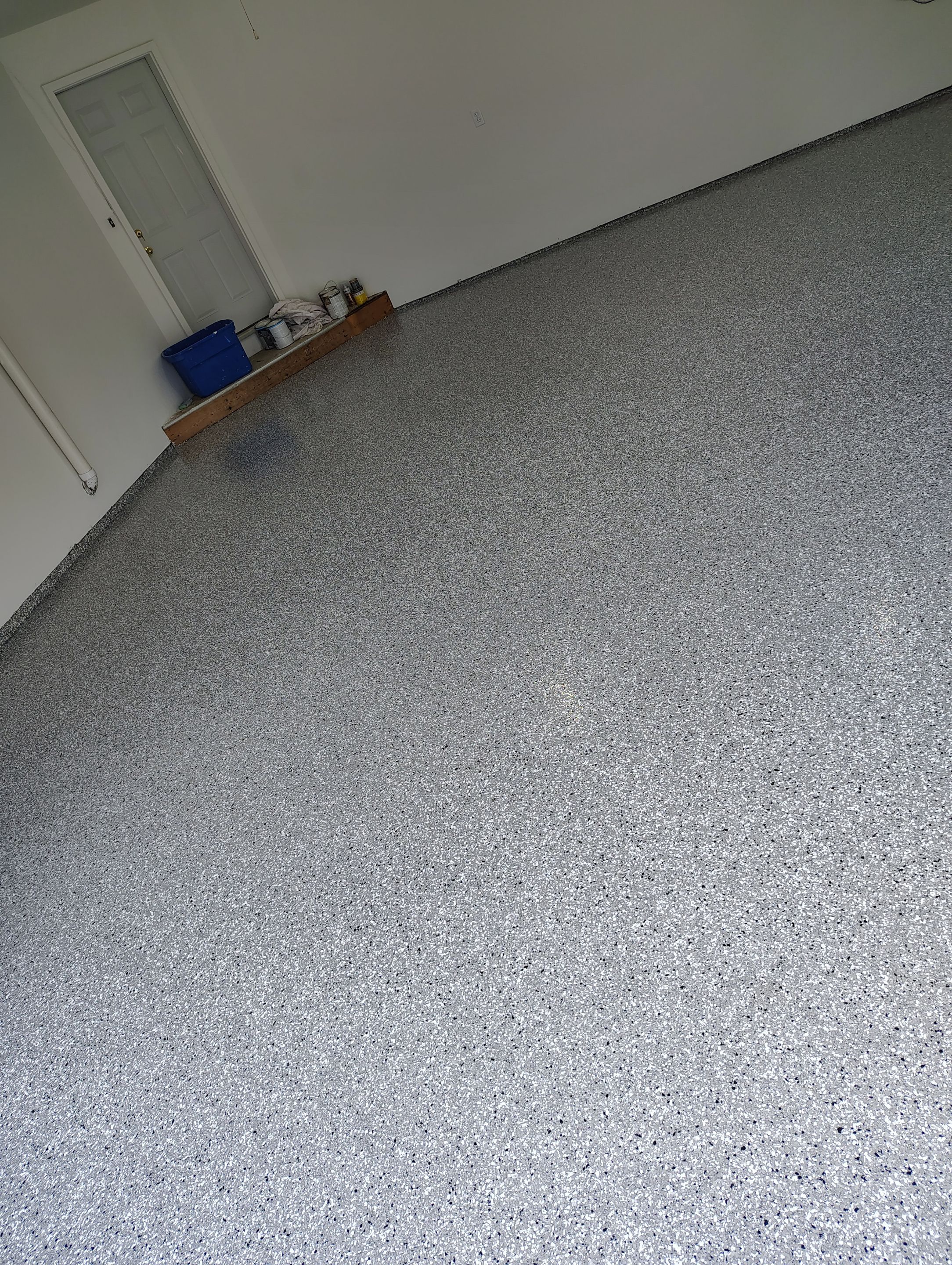 Sioux Falls Garage Floor Coating with Speckled Flake Finish by Select Painting, Coatings & Garage Cabinets