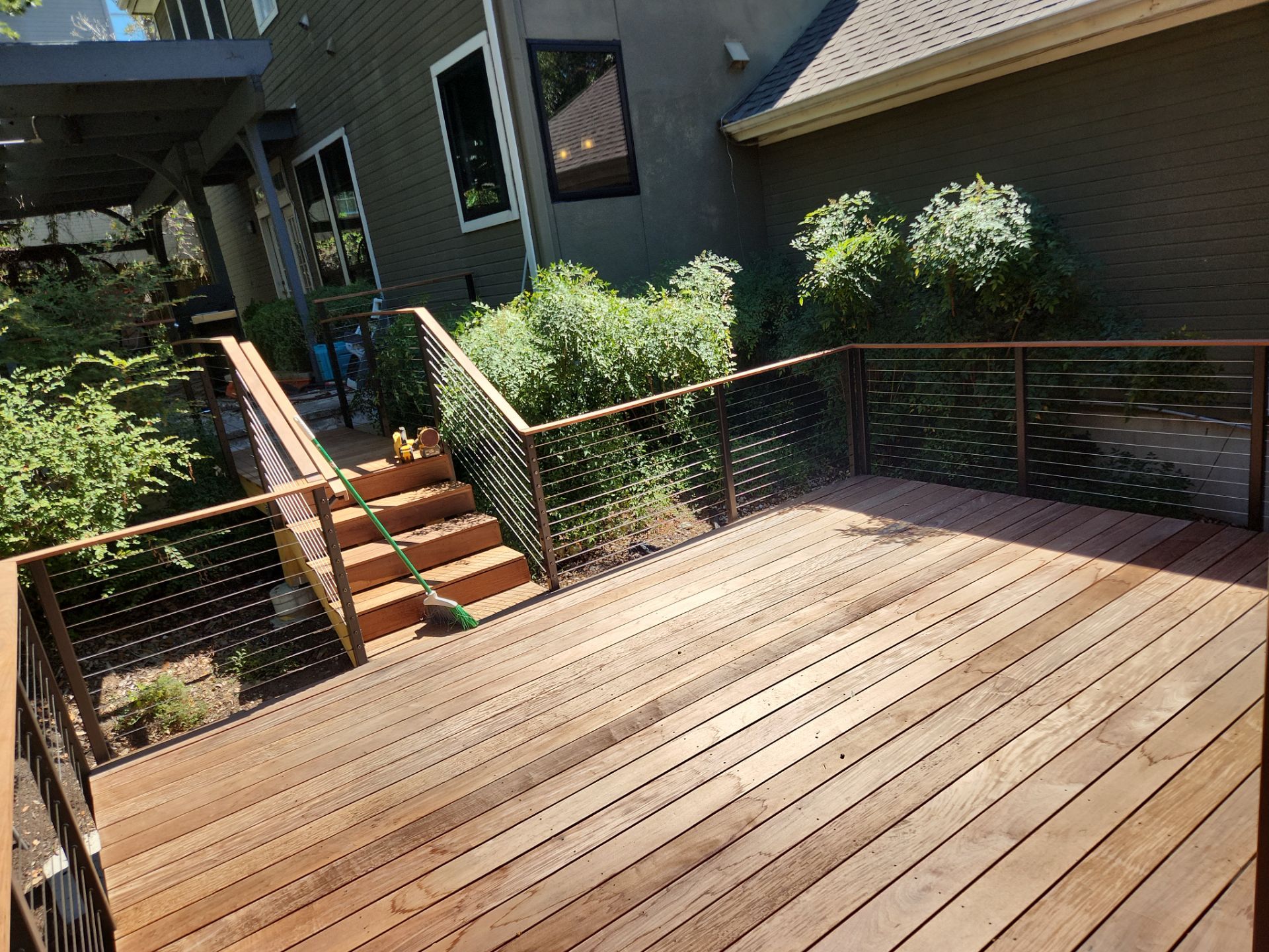 Austin Custom Deck Replacement with Cable Railings and Privacy Walls by RejuveNate Renovations LLC