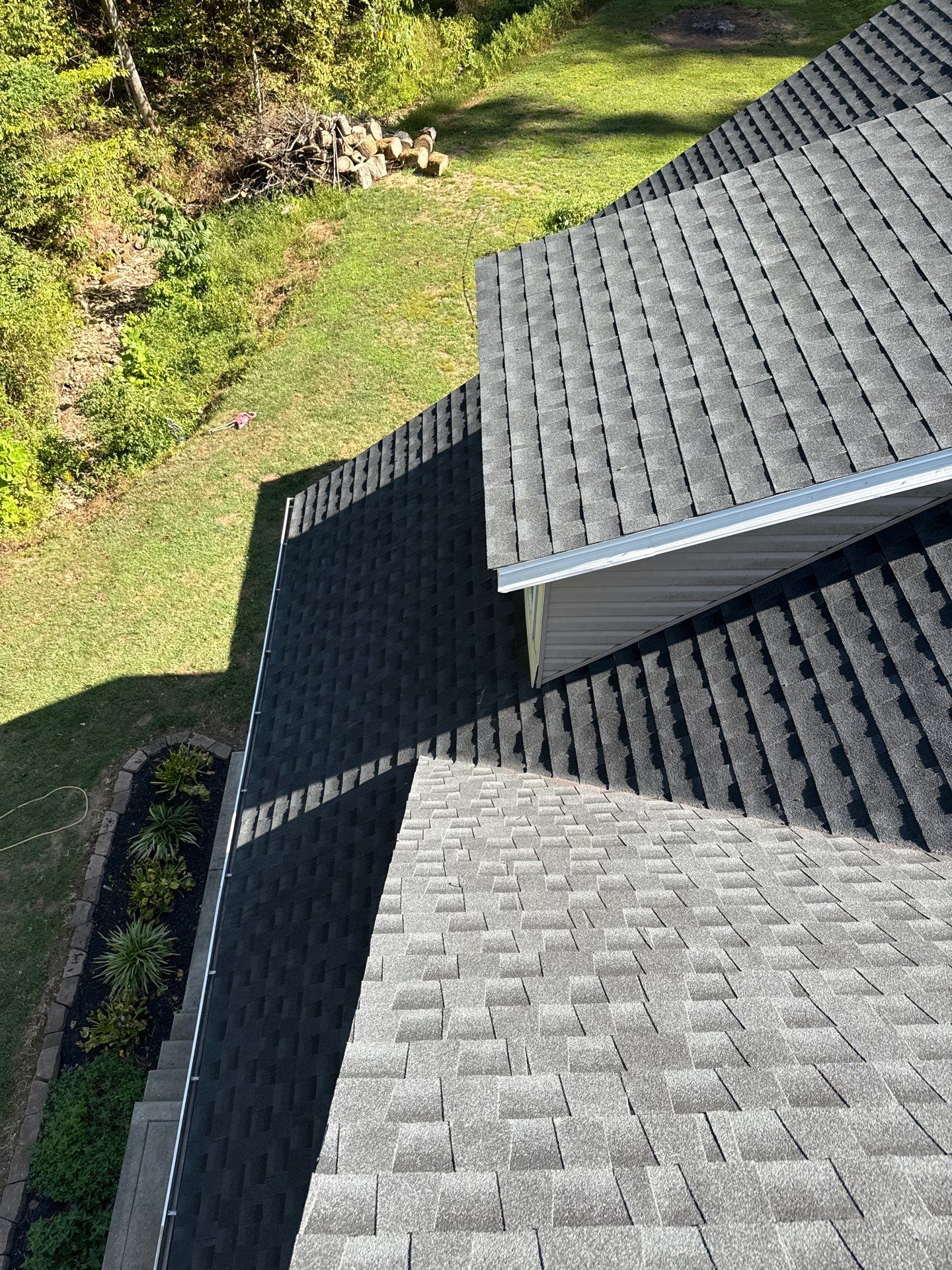 Residential Roofing Installation using GAF Timberline HDZ Charcoal by Rainstoppers Roofing