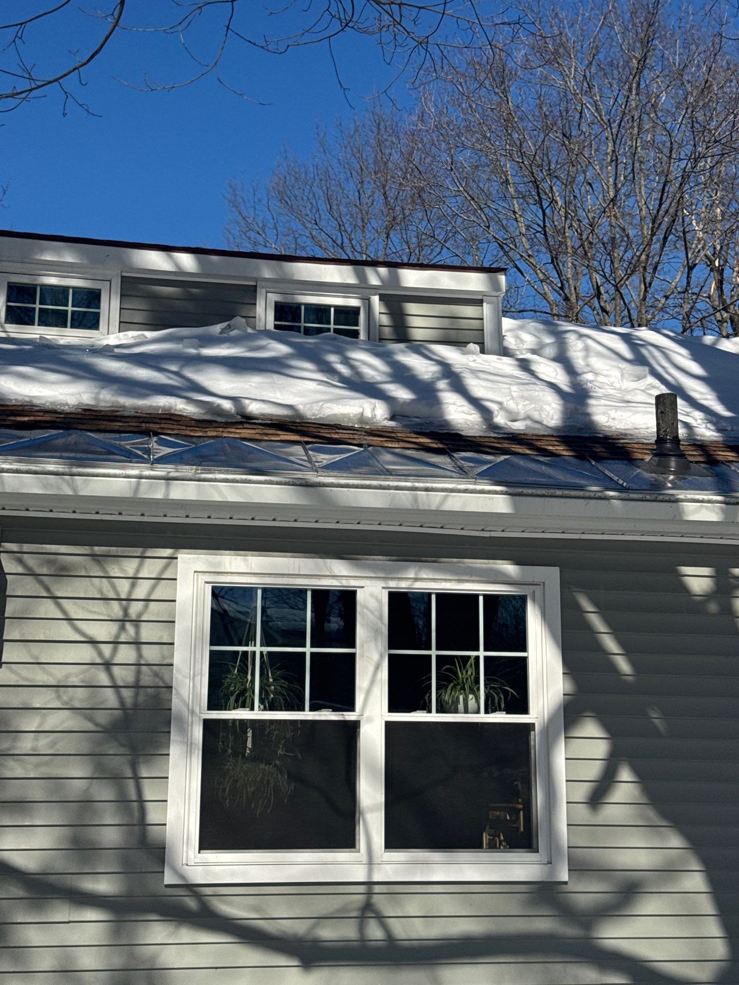 Snow/Ice Belt & Ice Dam Removal Project in Woburn by Mighty Dog Roofing of Greater Middlesex County