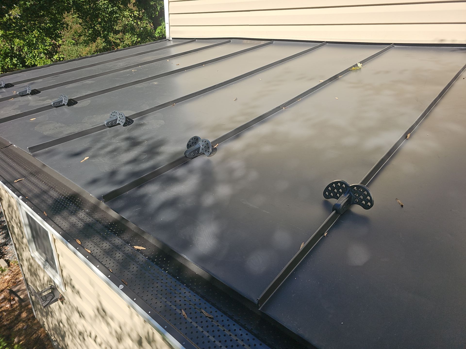 Metal Roof and Gutter Replacement by Winchester Roofing