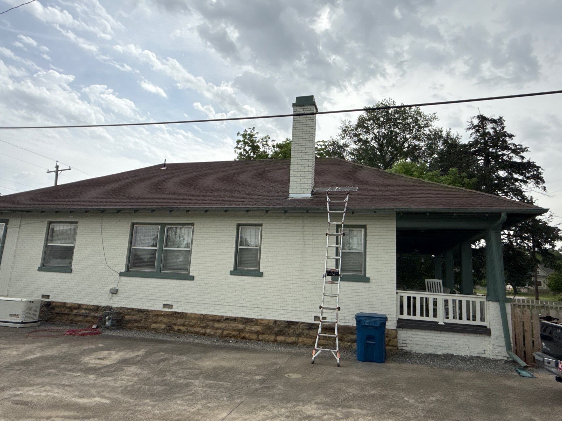 Owens Corning Onyx Black Shingles by In & Out Construction & Remodeling, LLC