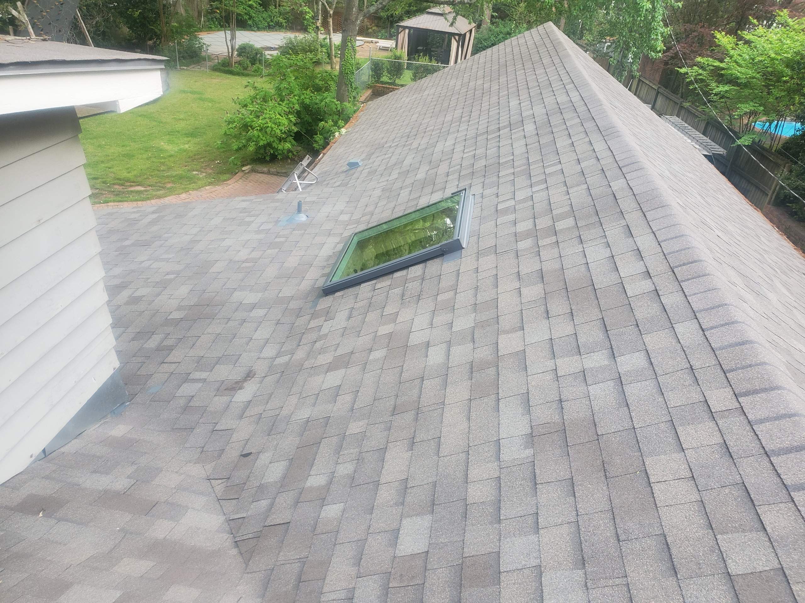 Architectural Shingle Roof Replacement with New Skylights in Memphis by Revival Roofing Services