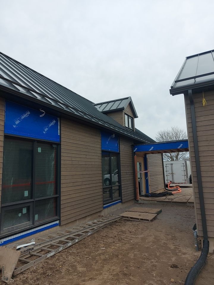 New Home Construction using 16" Standing Seam Panels by Jay Carter Roofing & Sheet Metal