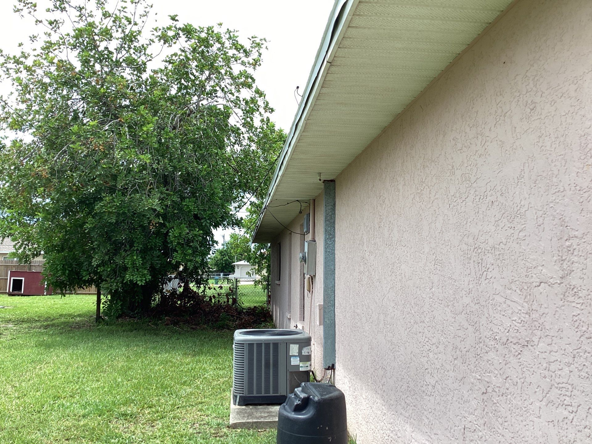 Replace gutter using White Down Spouts in Cape Coral FL by Gutter Professors