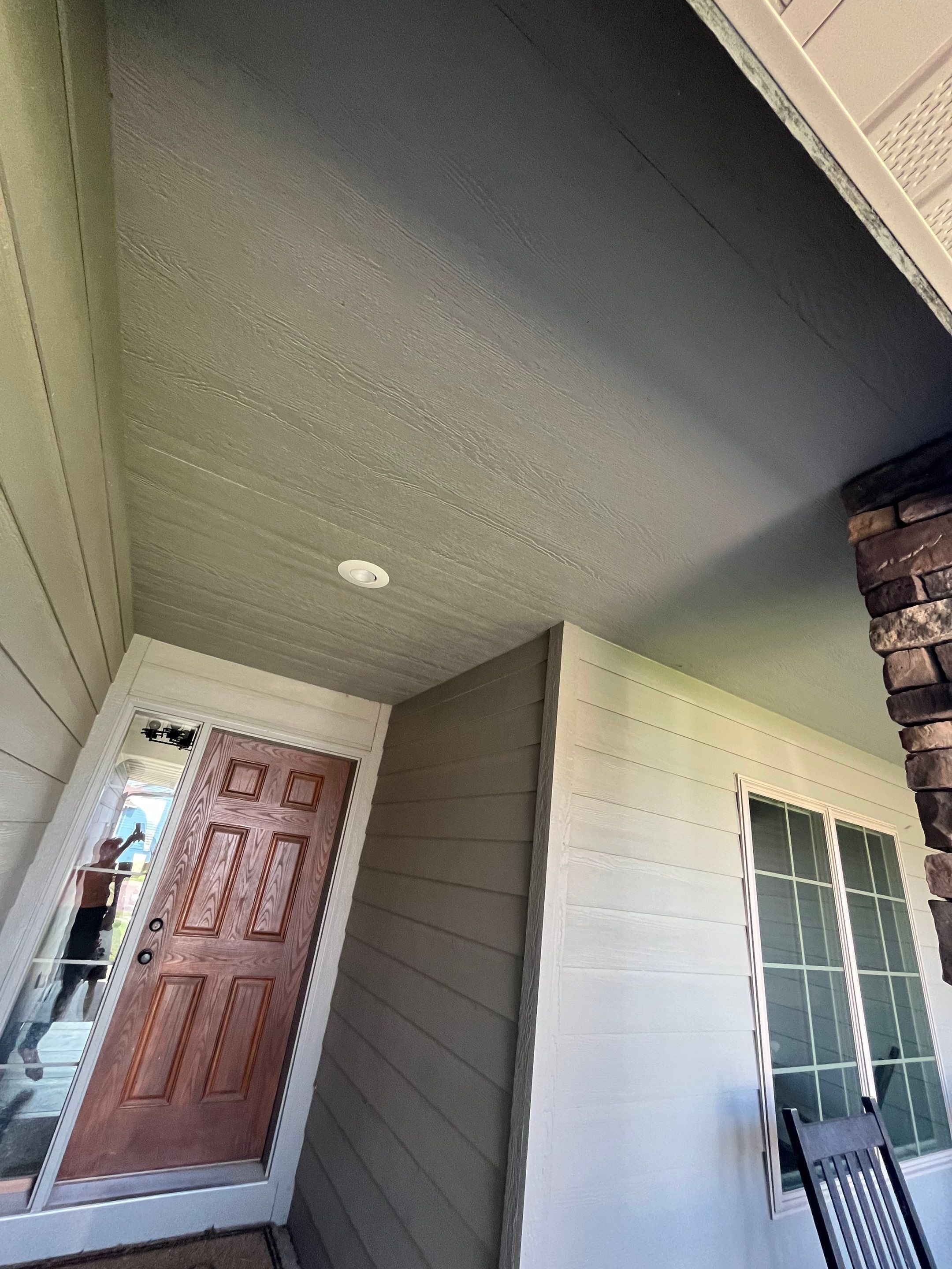 Sioux Falls Residential Exterior Refresh with Fiber Cement Siding by Select Painting, Coatings & Garage Cabinets