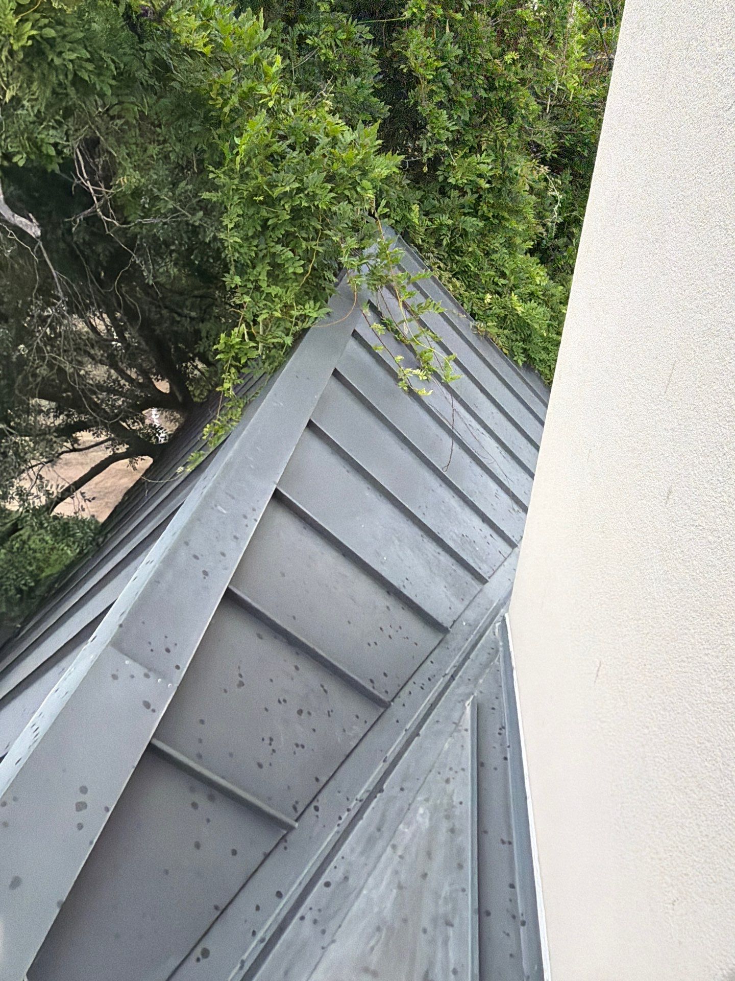 Standing Seam Metal Roof Leak Detection and Flashing Inspection in Dallas by Rich the Roofer LLC