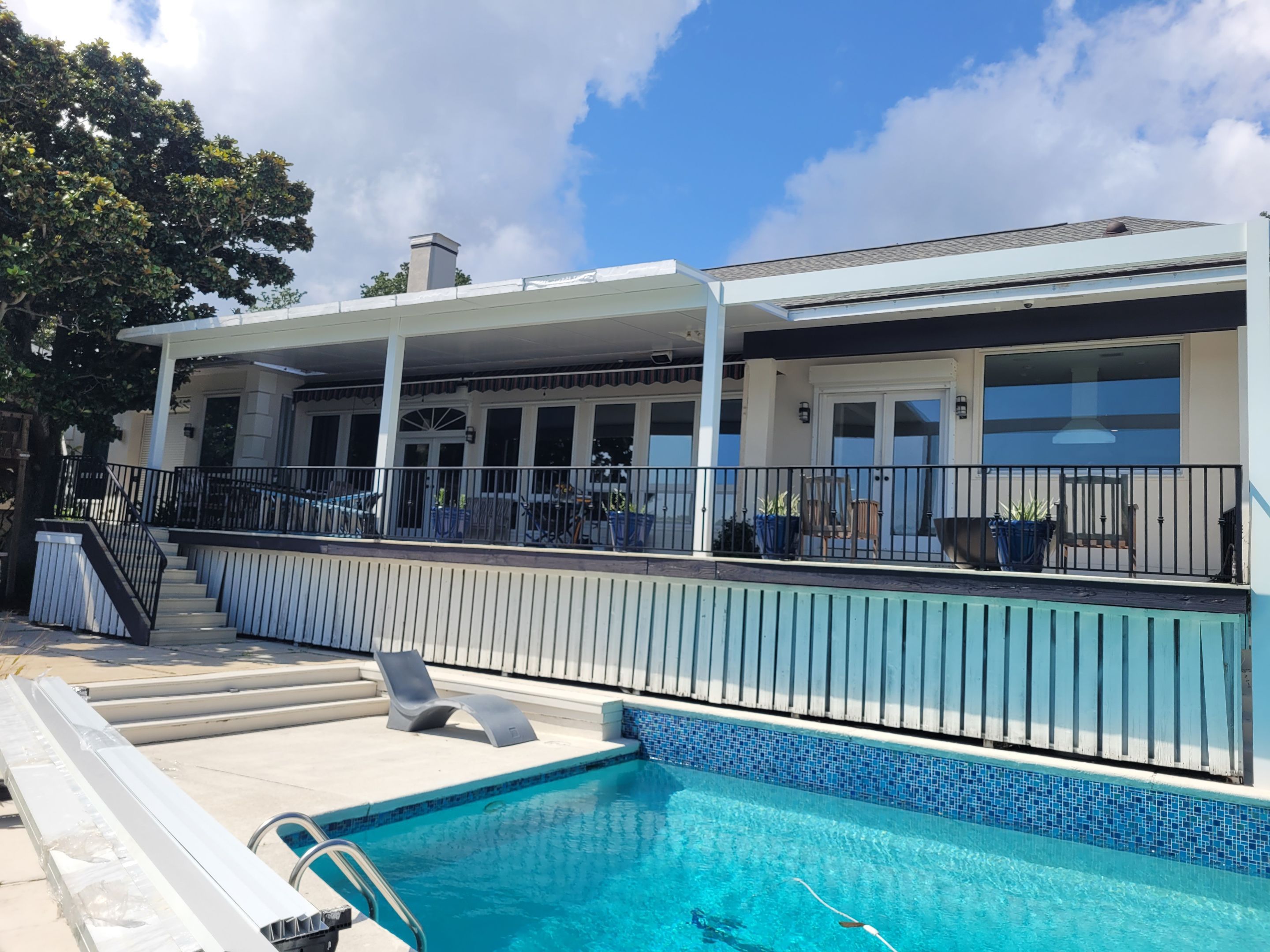 Poolside Colorbeam Patio Cover in Gulf Breeze by Titan Sunrooms