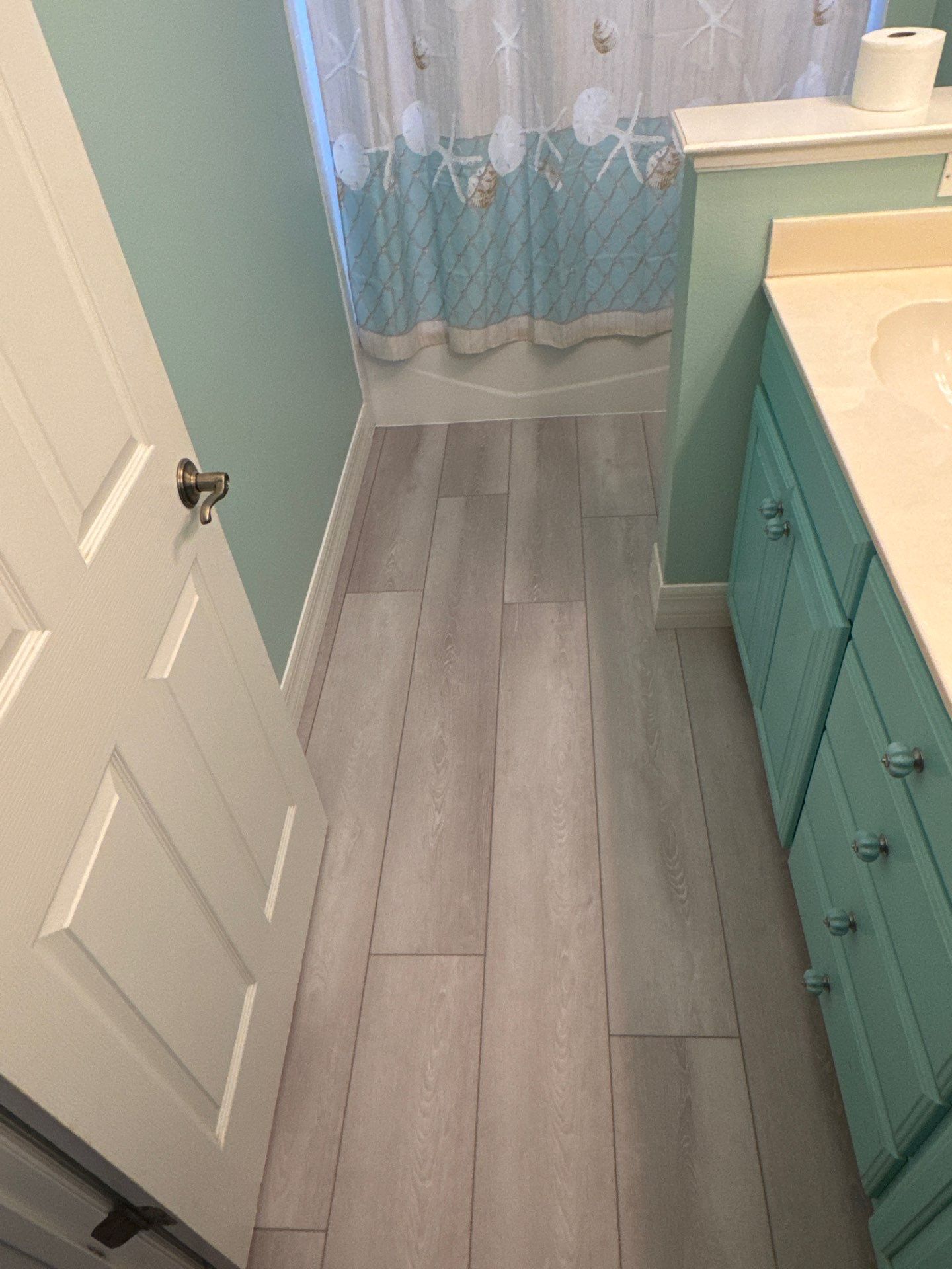 Bathroom upgrade ( From tile to LVP)  by Vrmmm Flooring