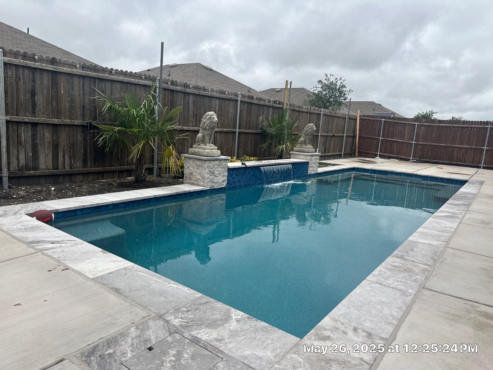 Geometric Pool with Raised Fountain Wall by Pinnacle Pools and Spas - DFW