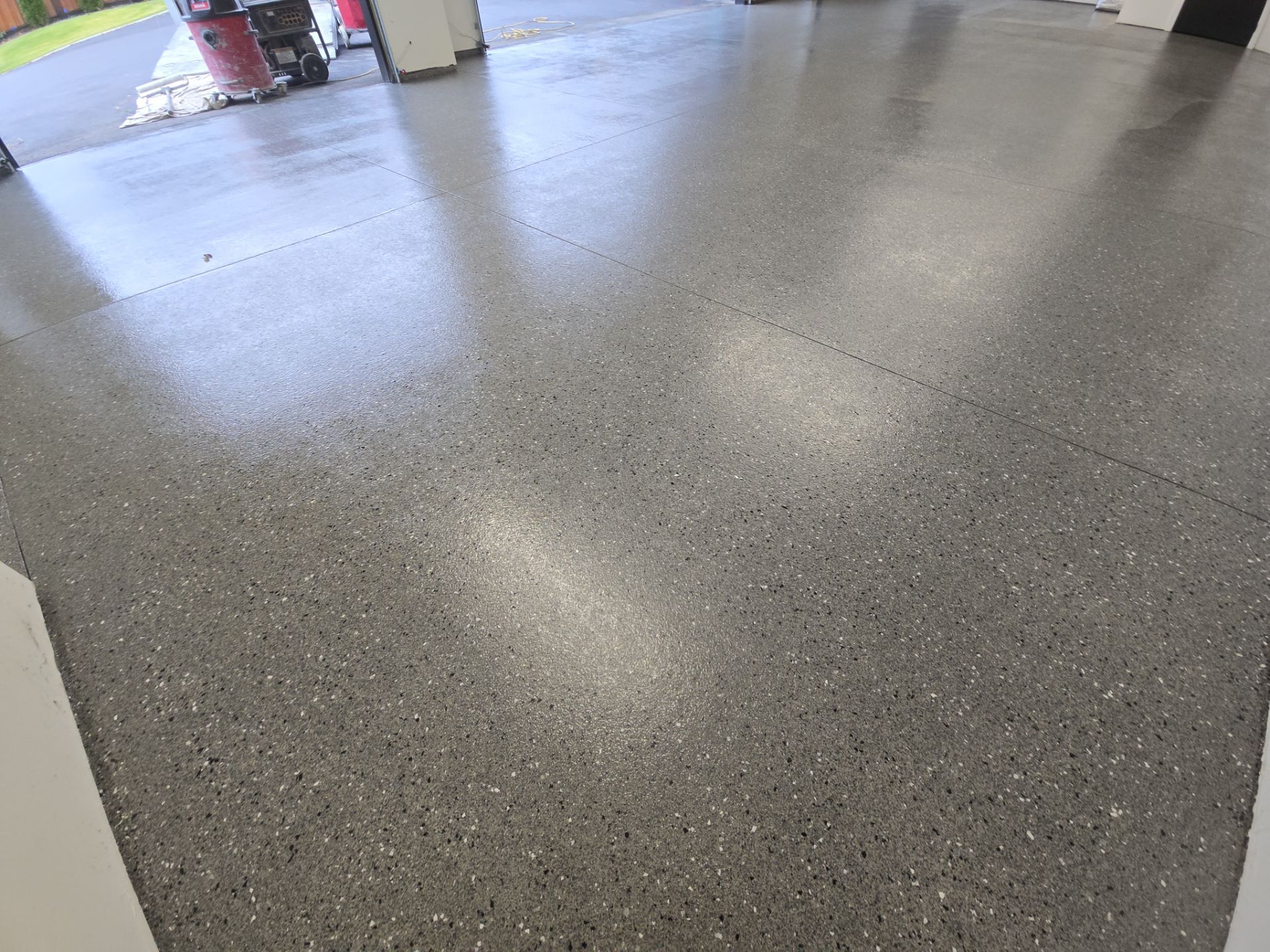 Garage Transformation using Slate Hybrid by Croc Coatings, LLC