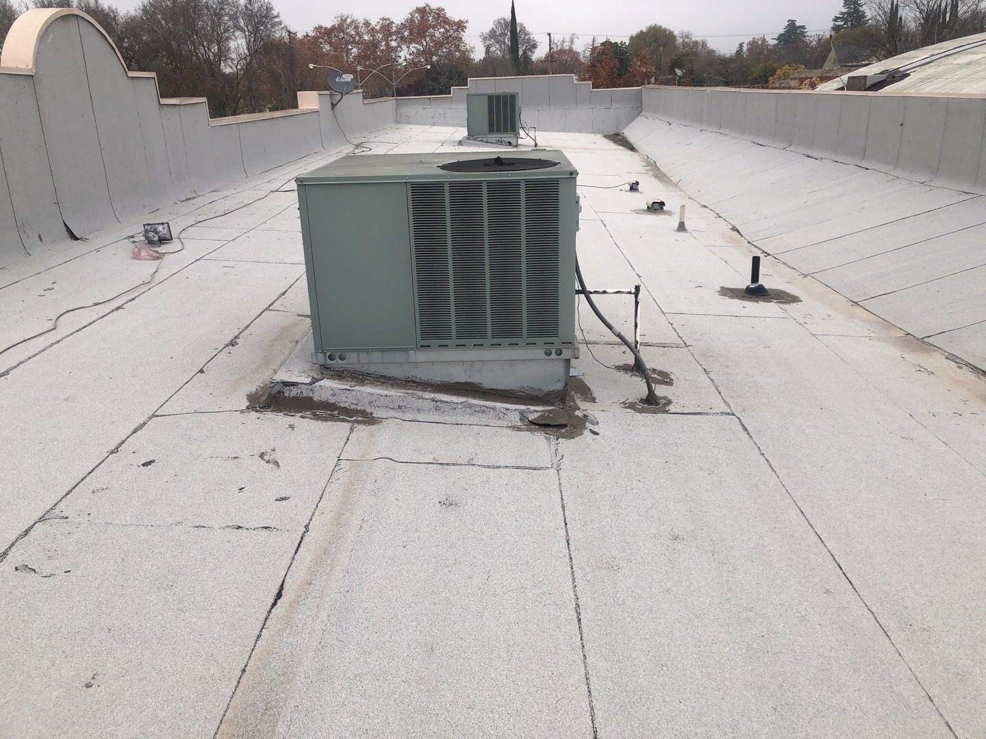 Spray foam and coatings using Conklin Benchmark/PUMA XL coatings and spray foam by Straight Edge Roofing Inc