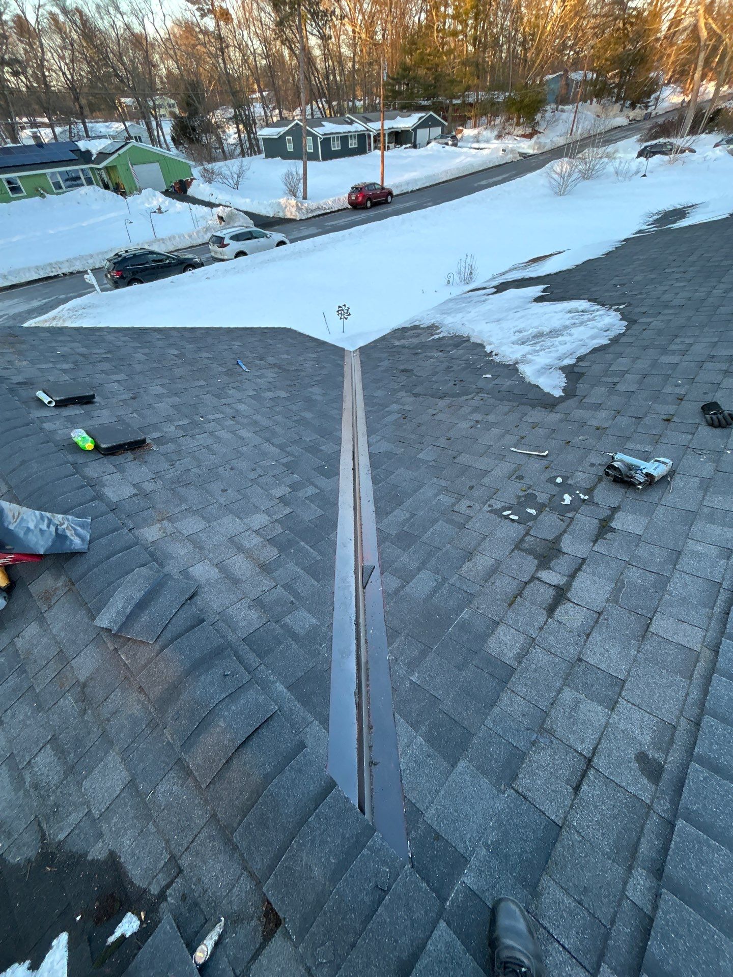Ridge Cap Replacement & Black Metal Valley Installation in Chelmsford, MA by Mighty Dog Roofing of Greater Middlesex County