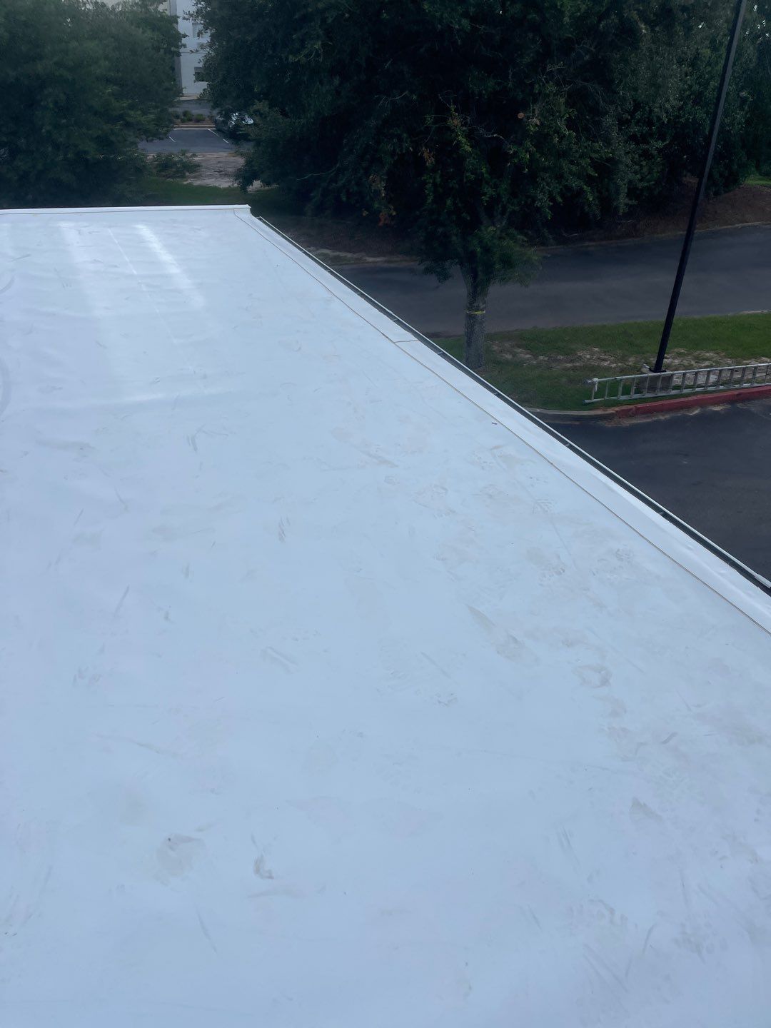 Commercial Roofing Installation using Roof Replacement by American Roofing & Construction LLC