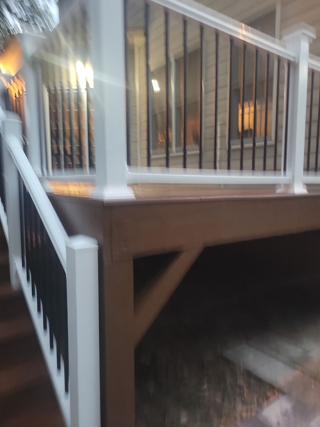 Fuquay-Varina Outdoor Upgrade – Composite Deck & Paved Landing by Elite Remodeling and Design LLC