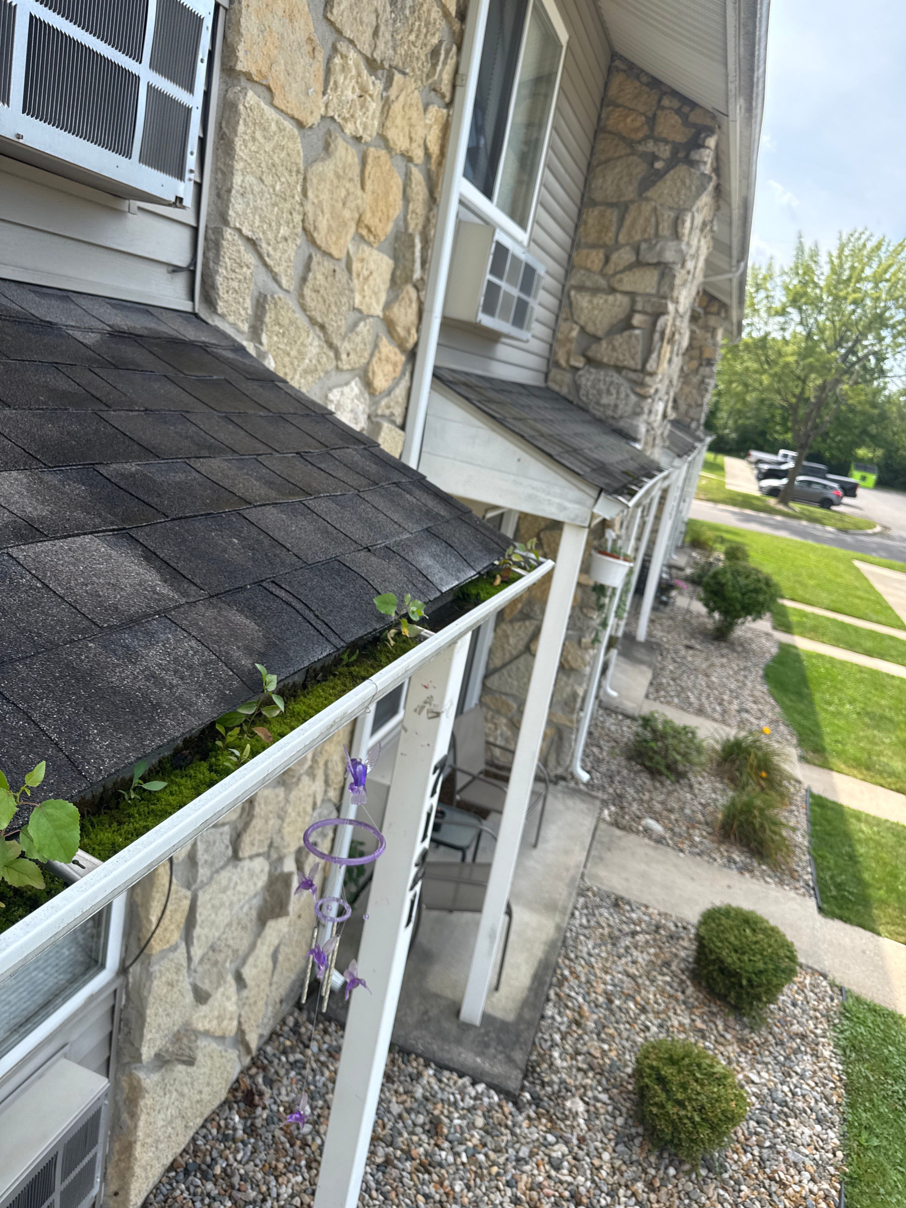 Commercial gutter cleaning Fort Wayne before photo with filled gutters