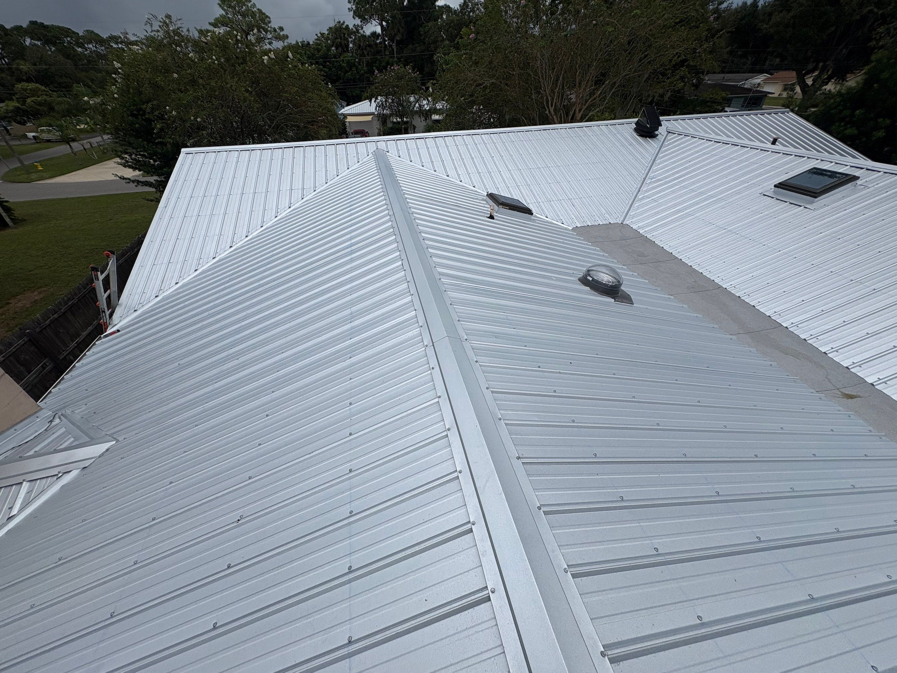Residential Metal Roofing Installation with Ultra Rib Panels in New Smyrna Beach by Pinnacle Roofing Group